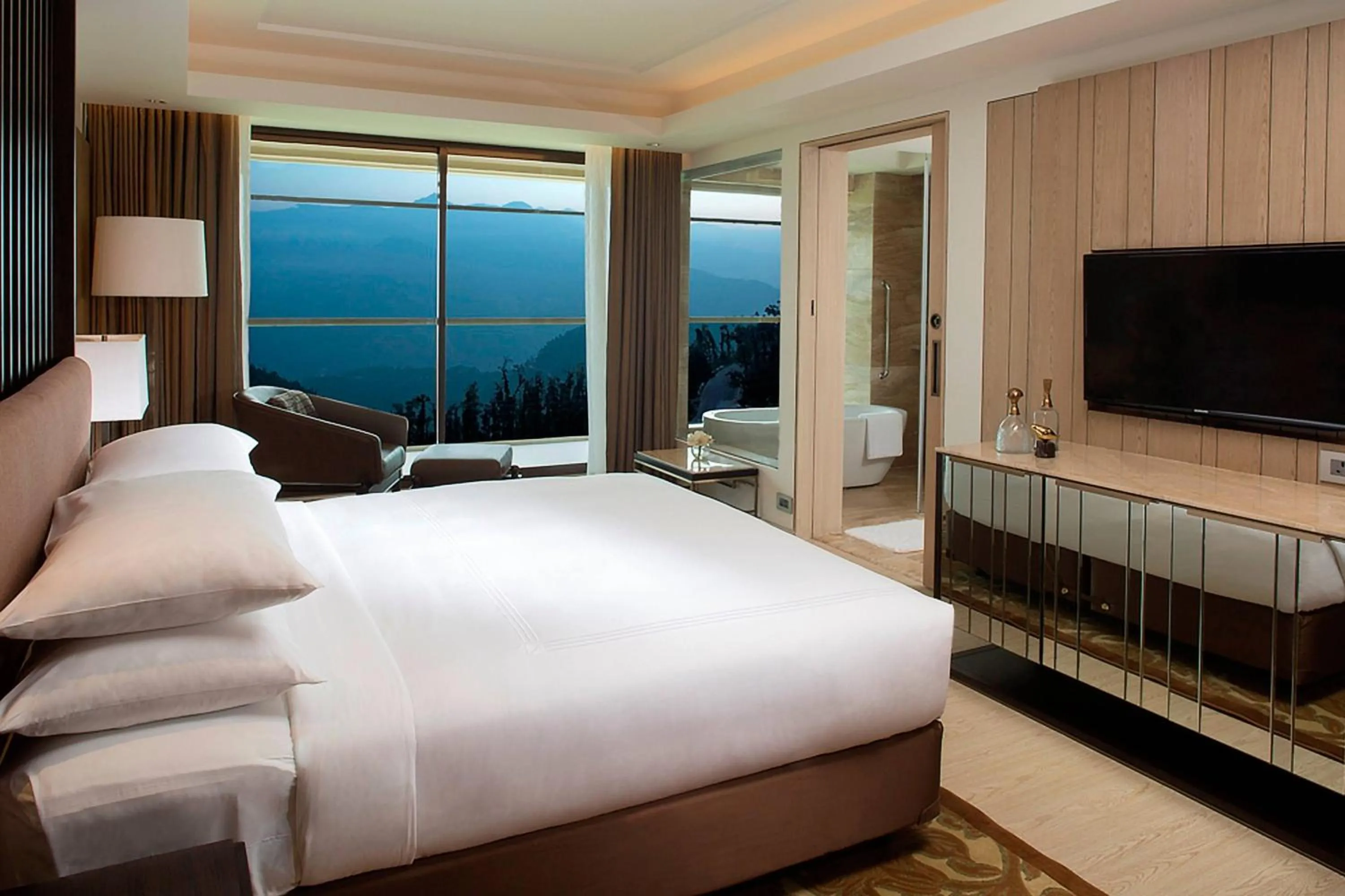 Photo of the whole room, Bed in JW Marriott Mussoorie Walnut Grove Resort & Spa