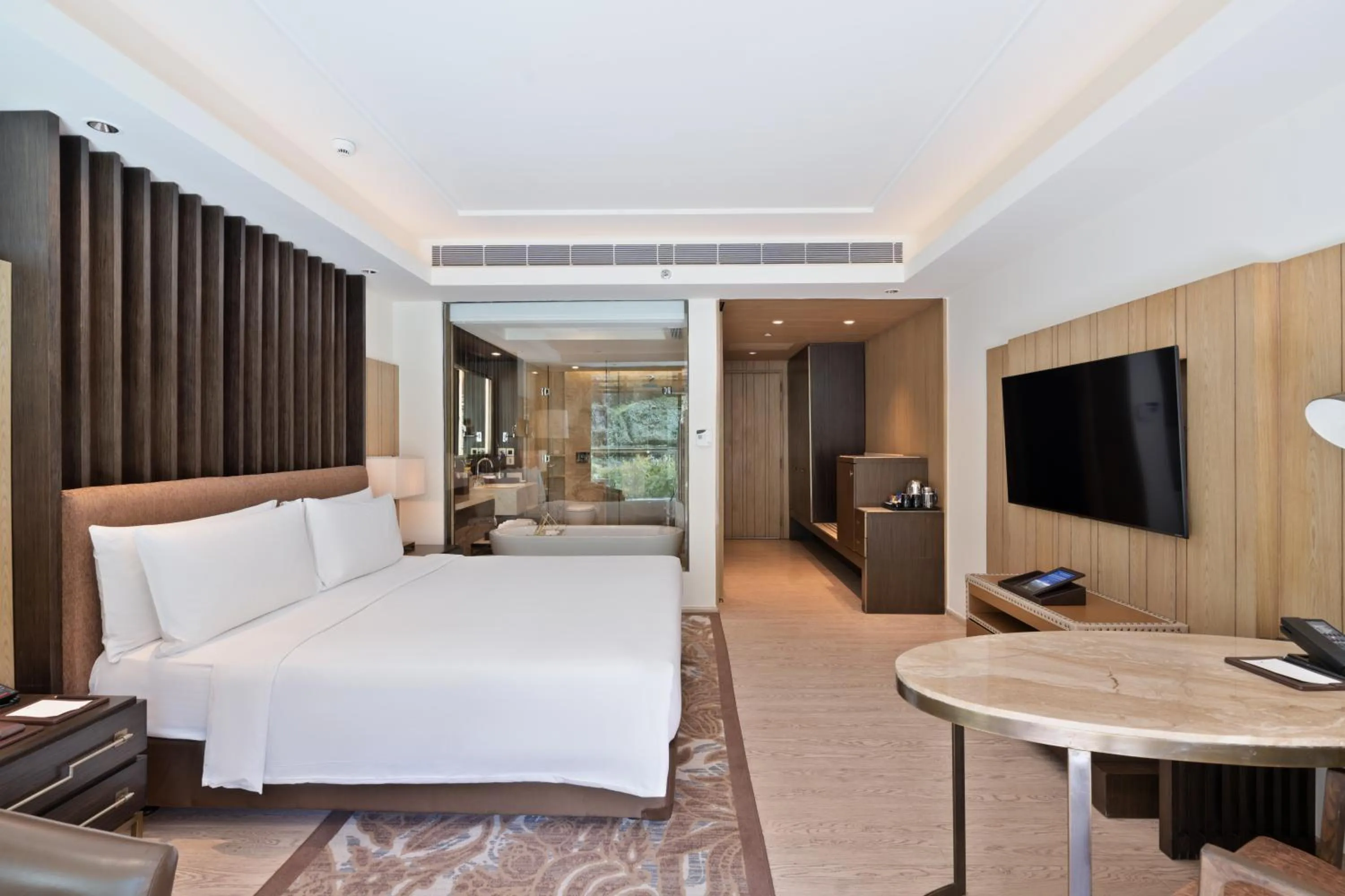 Bed in JW Marriott Mussoorie Walnut Grove Resort & Spa