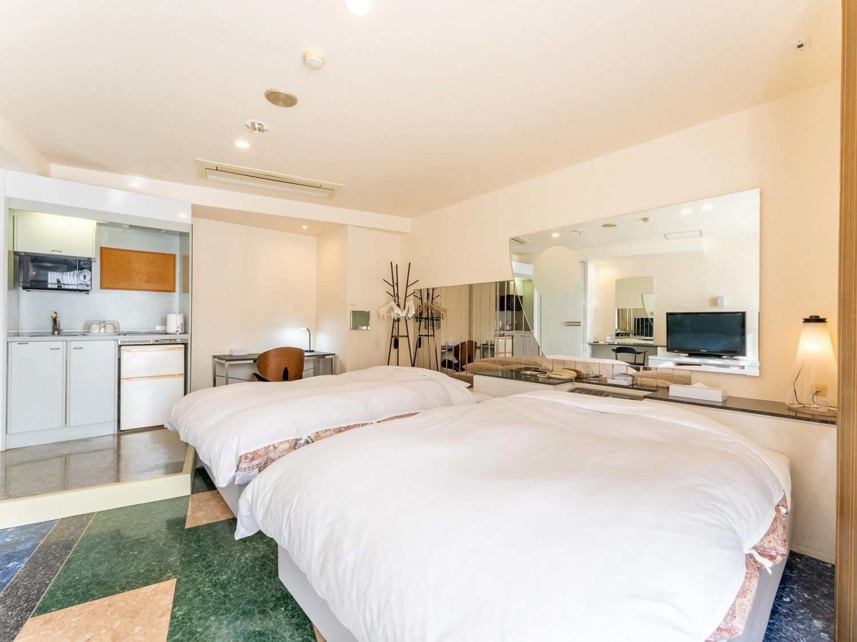 Bed in Tabist Shizukuishi Resort Hotel