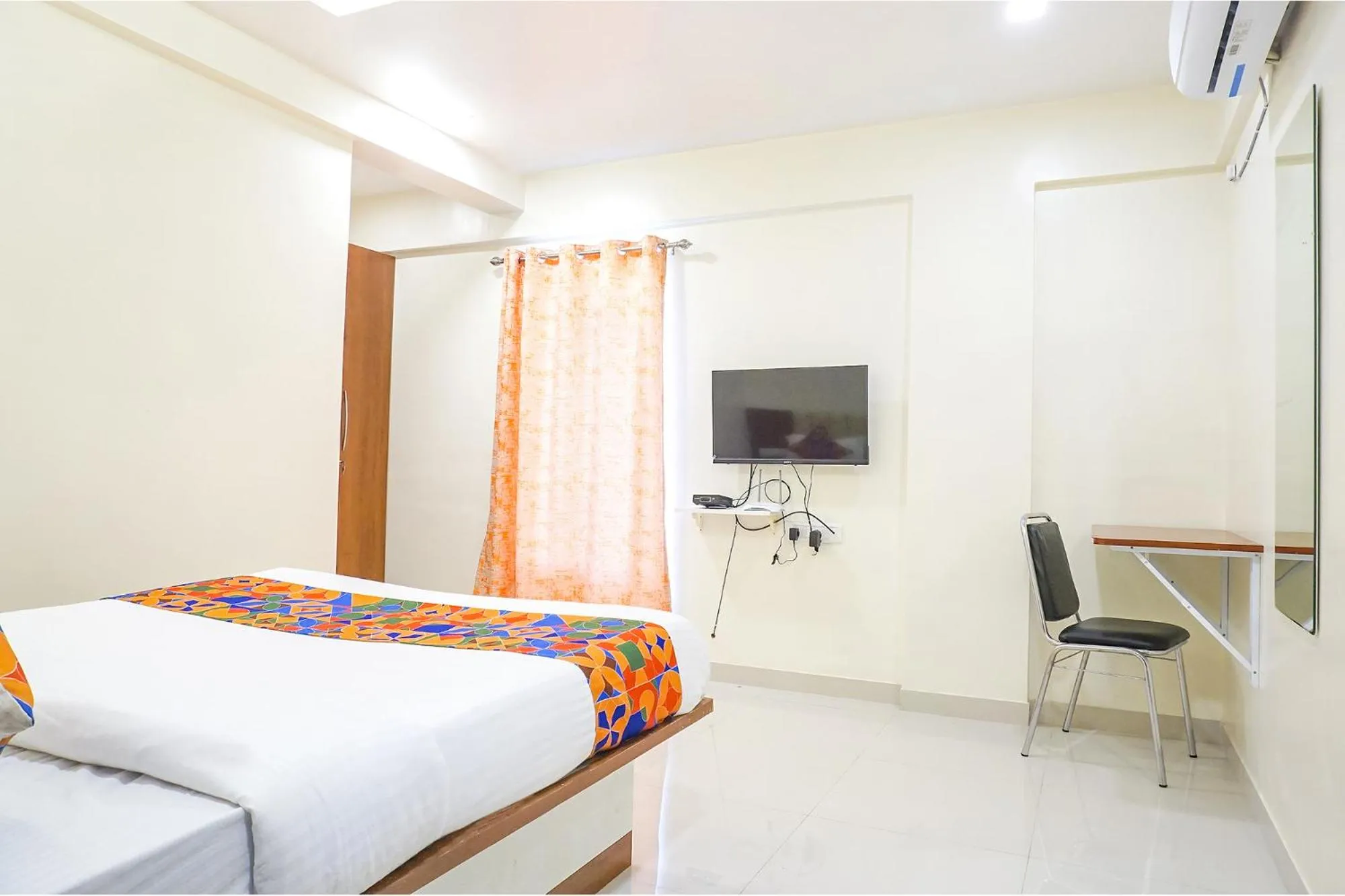 Bed in FabHotel Majestic Luxurious - Nr Rajaram Bhiku Pathare Stadium
