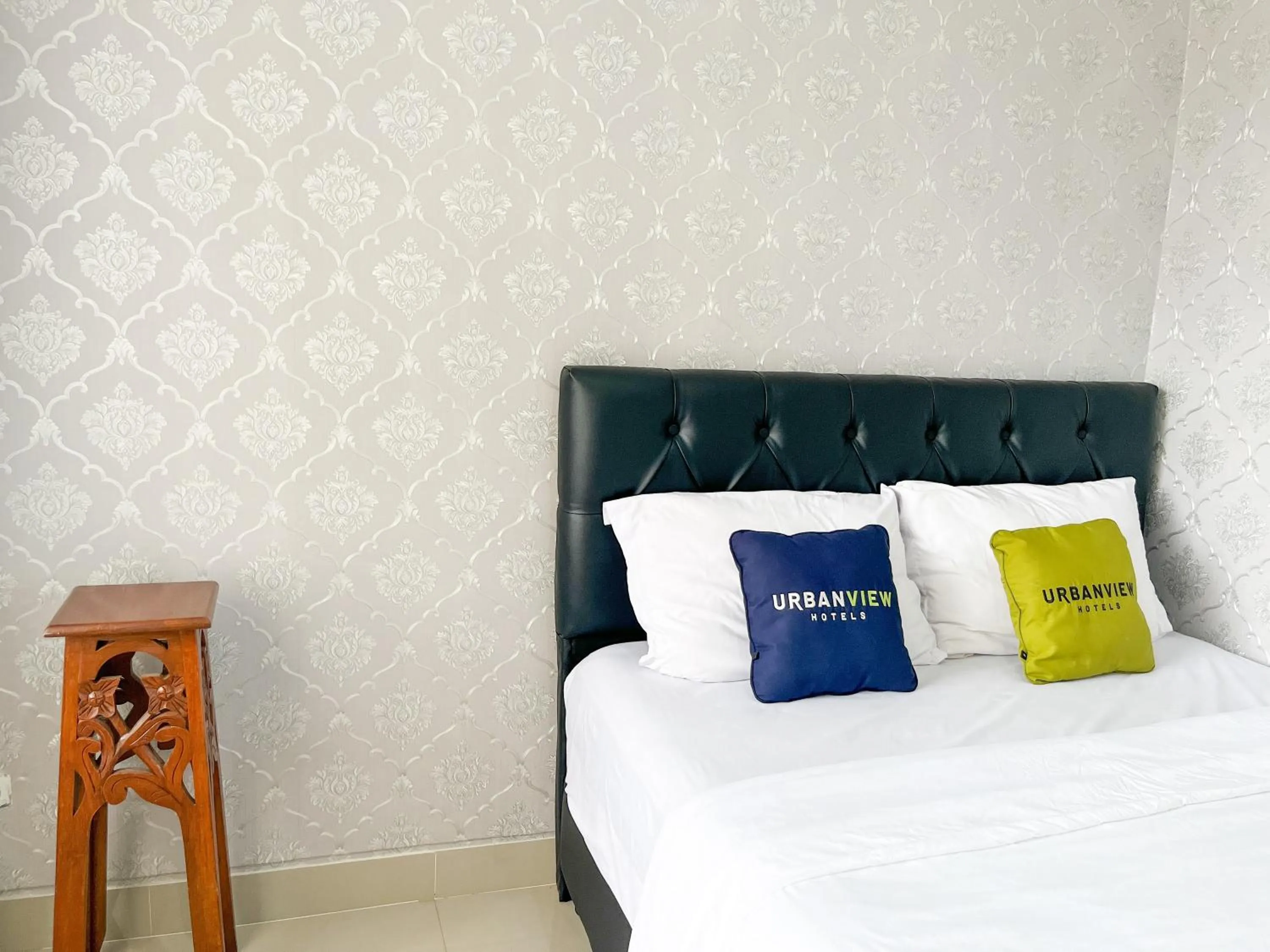 Bed in Urbanview Syariah Hotel Kanigara Batu