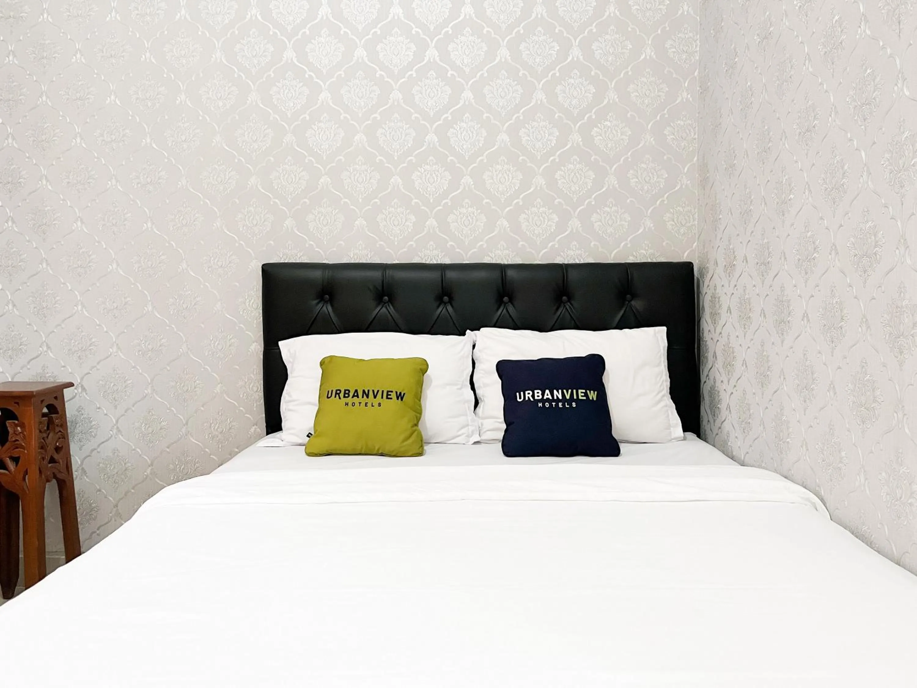 Bed in Urbanview Syariah Hotel Kanigara Batu