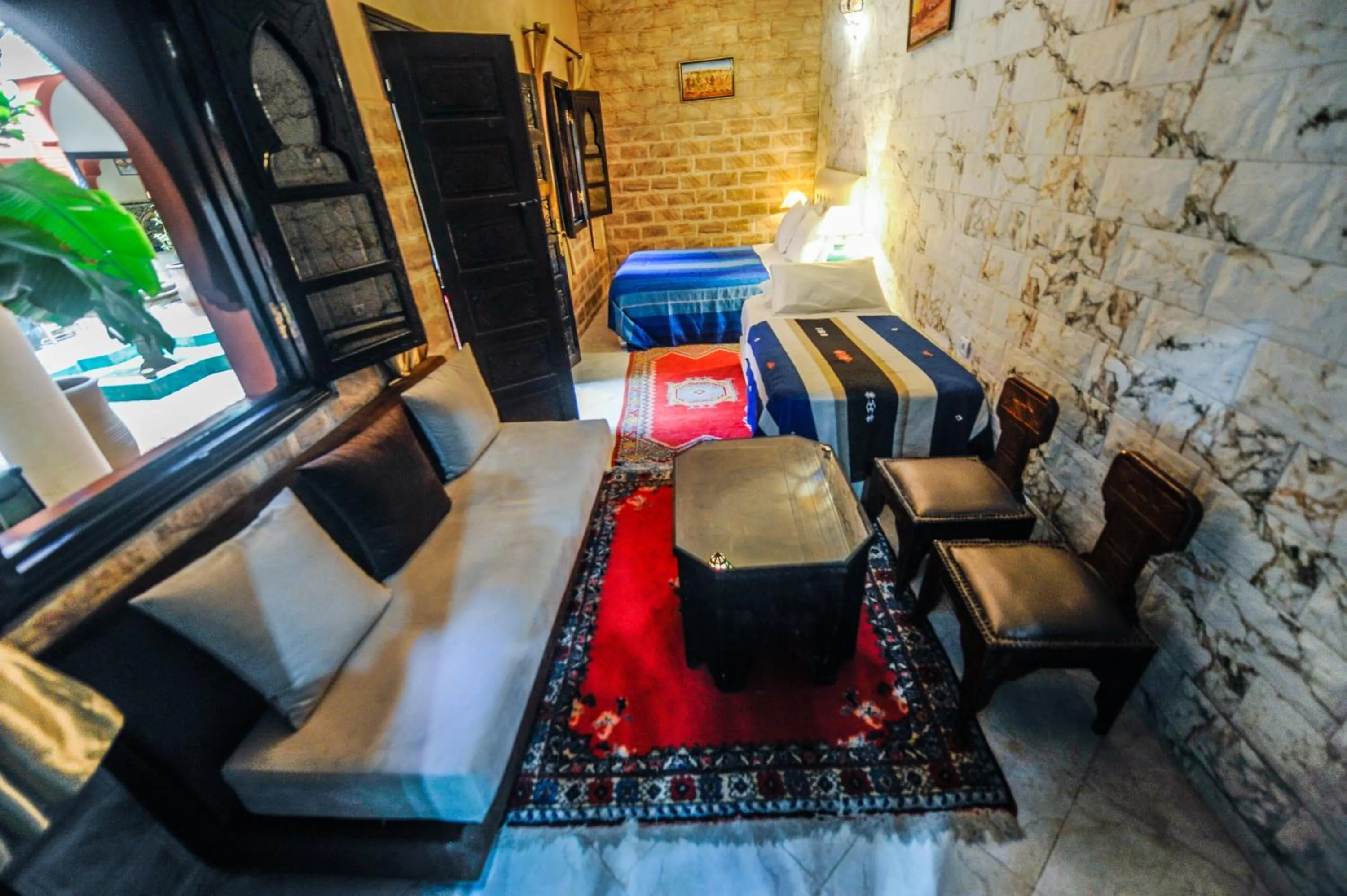 Seating area, Bed in Riad Errabii & Spa