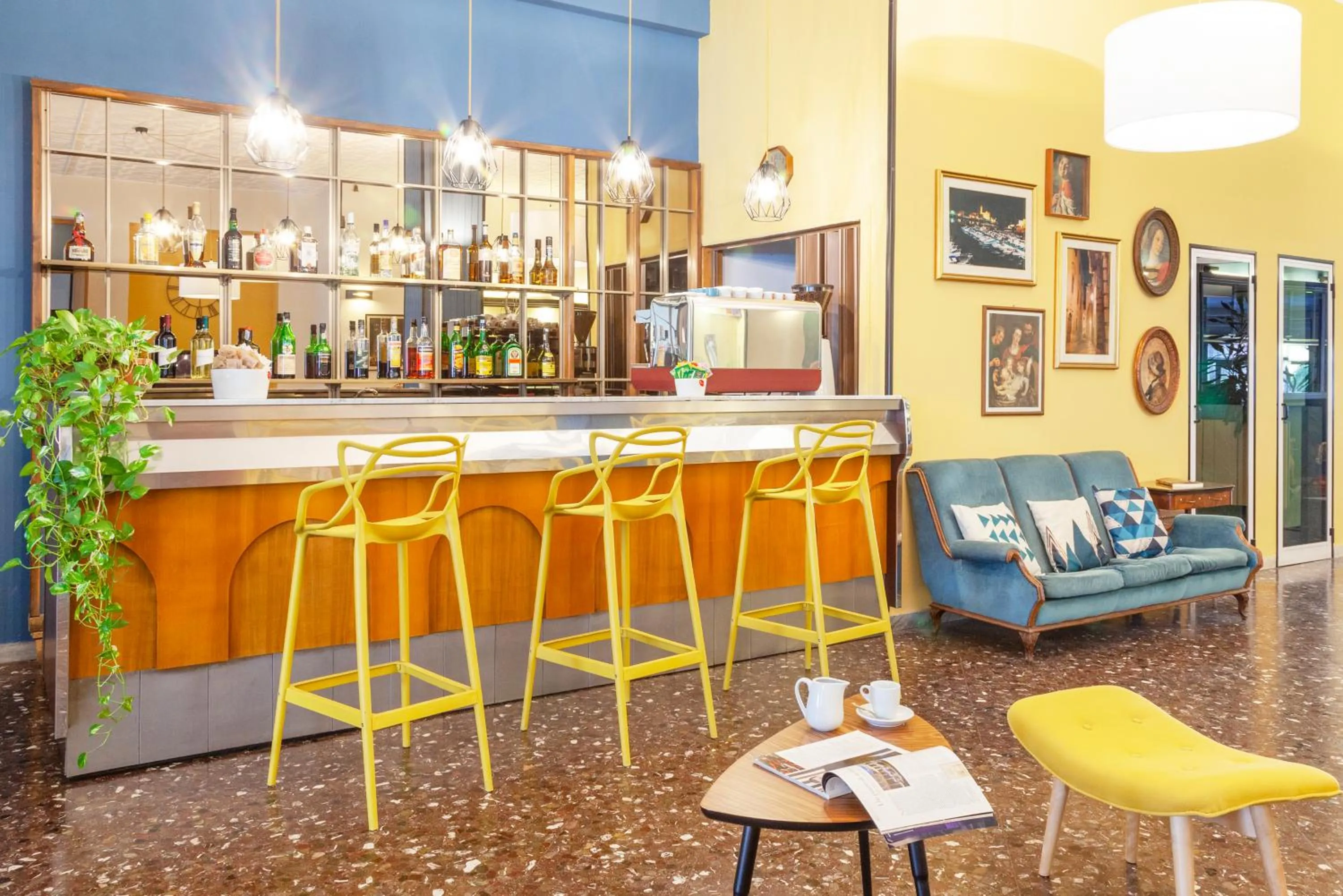 Communal lounge/ TV room in ibis styles Trani