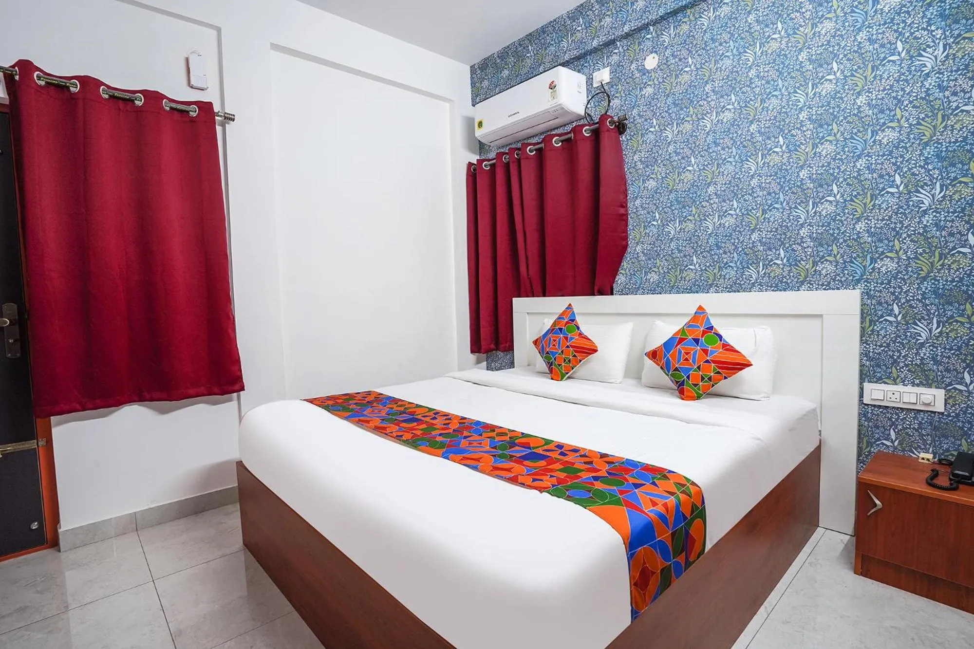 Bed in FabHotel Royal Platinum Suites