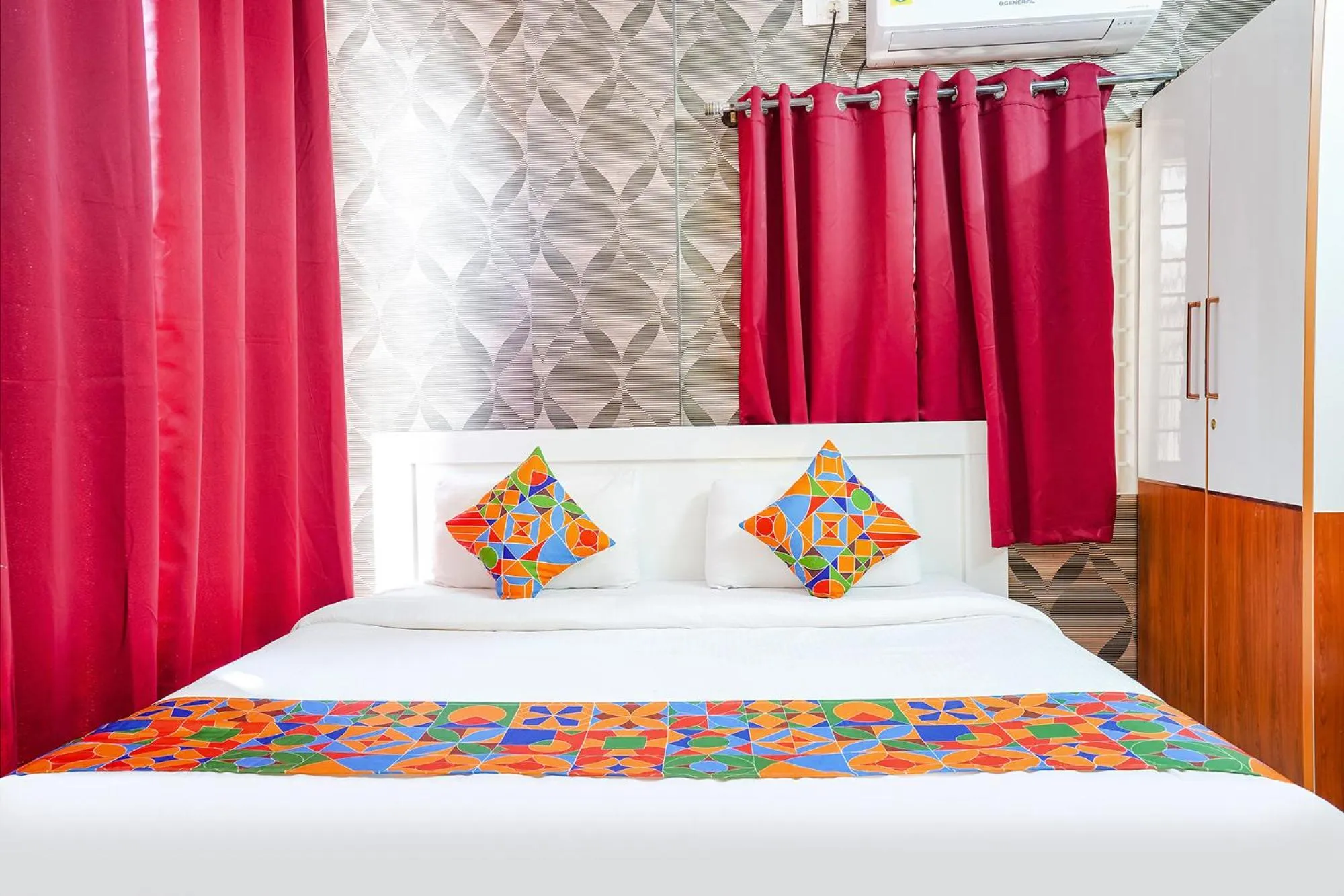 Bed in FabHotel Royal Platinum Suites