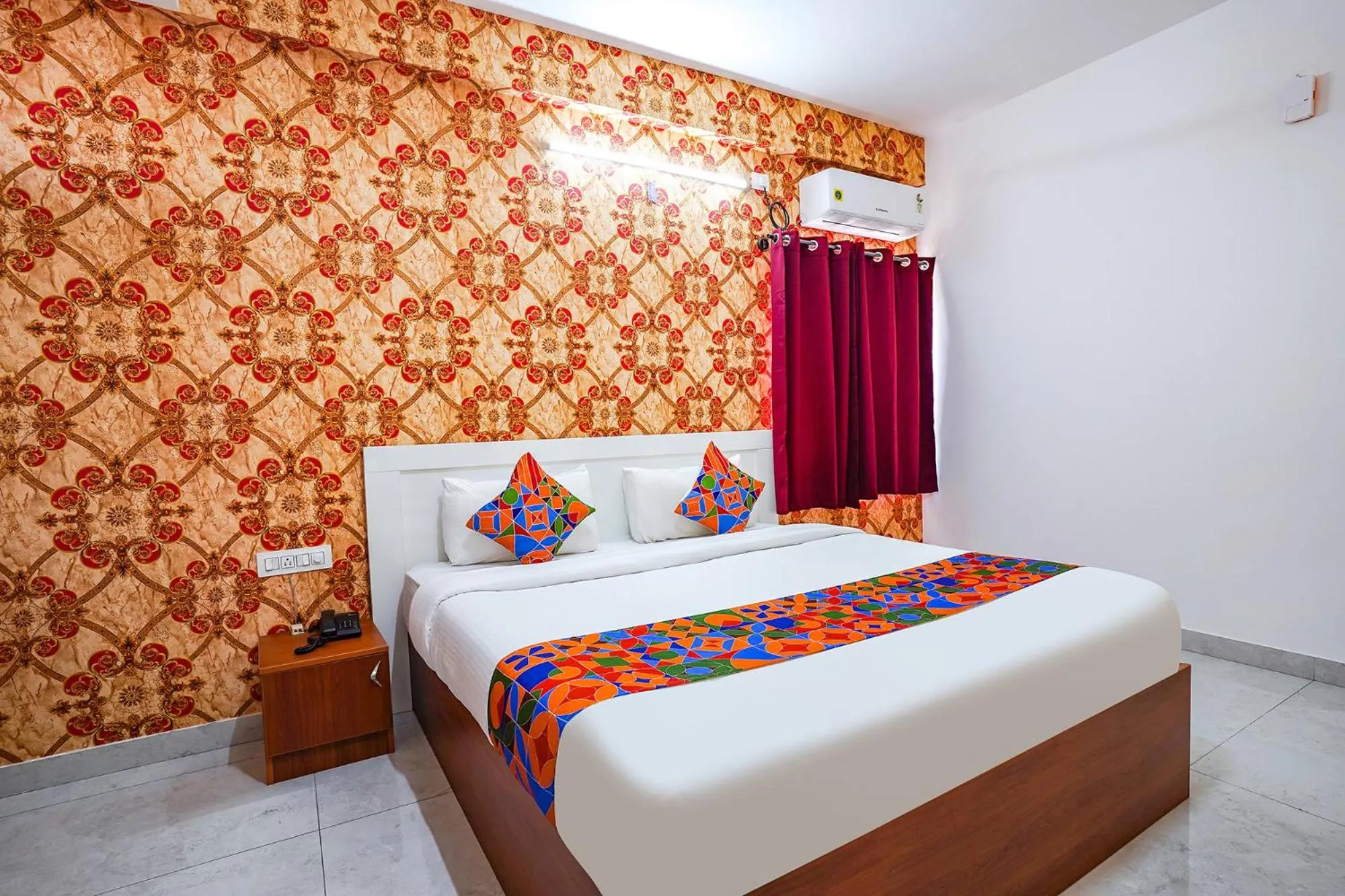 Bed in FabHotel Royal Platinum Suites