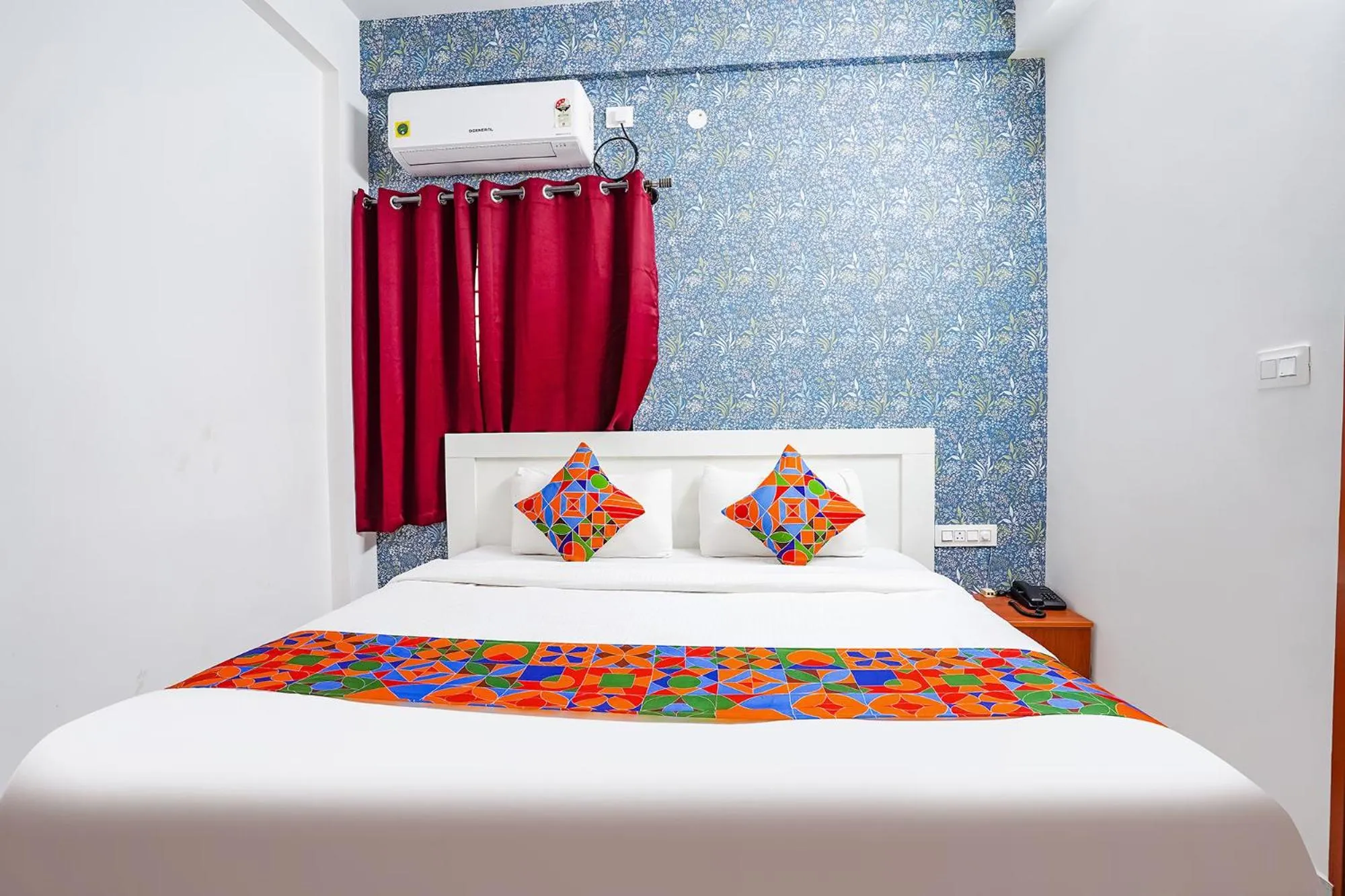 Bed in FabHotel Royal Platinum Suites