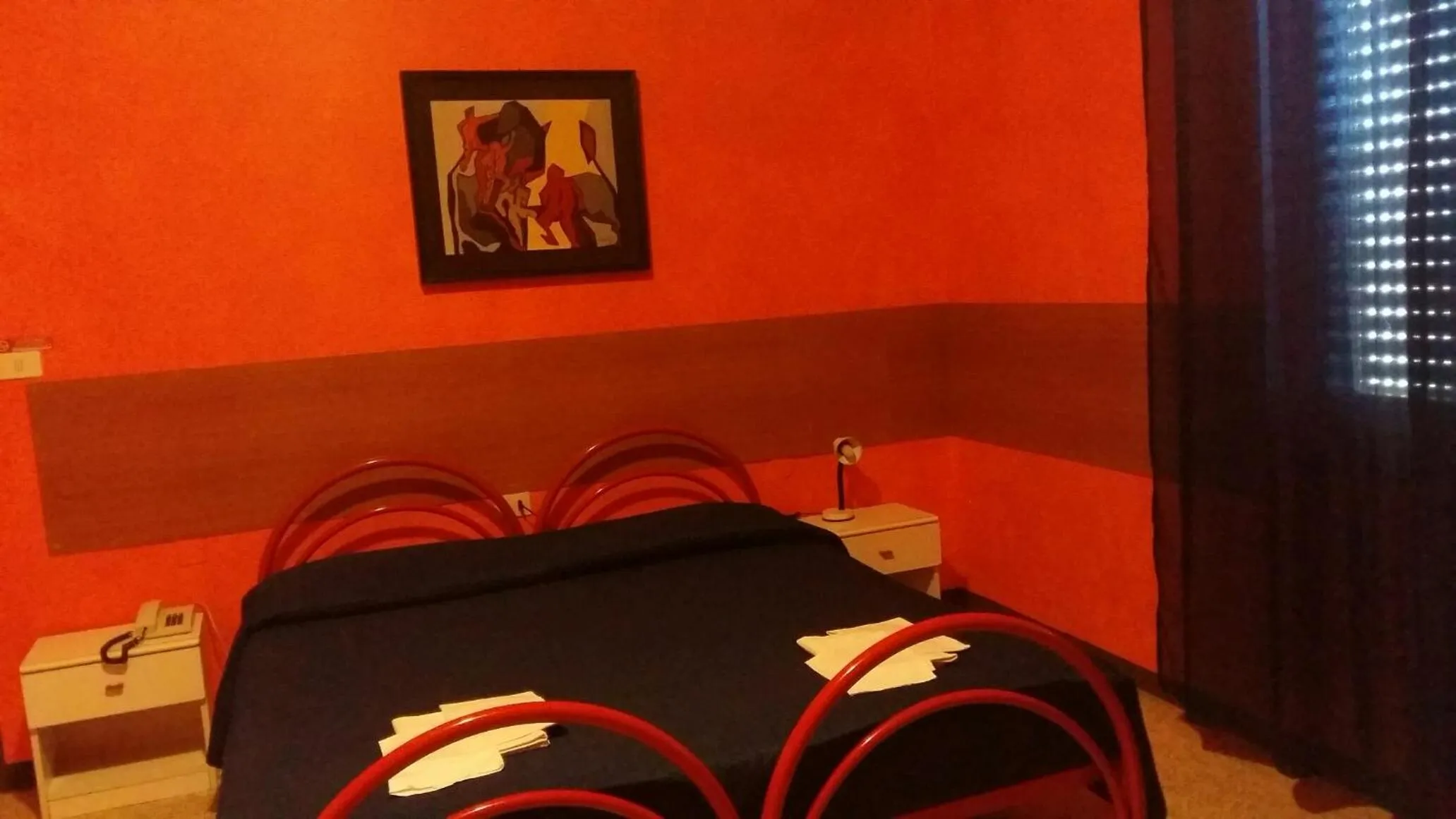 Bed in Hotel Violetta