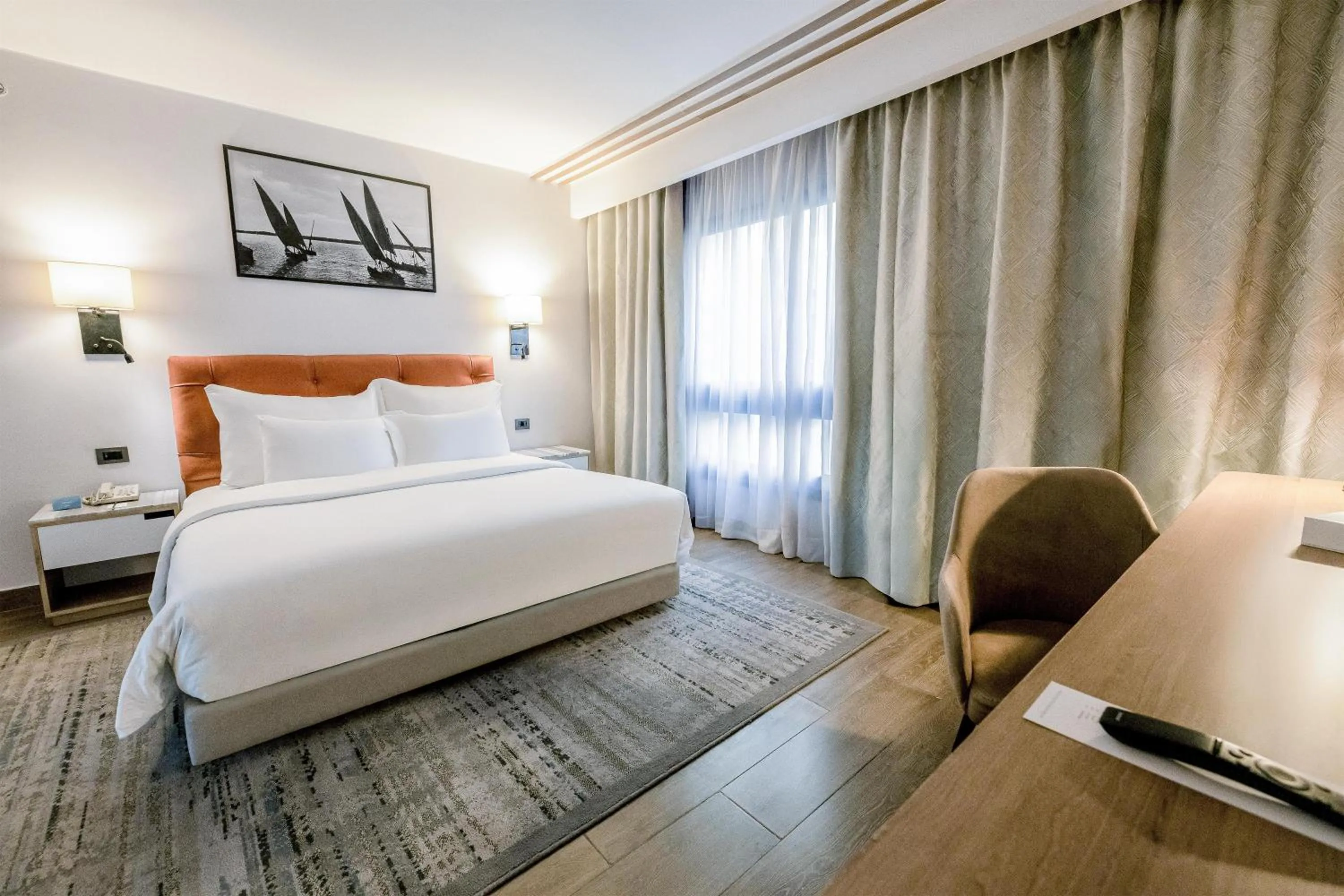 Photo of the whole room, Bed in Radisson Residences Cairo Heliopolis