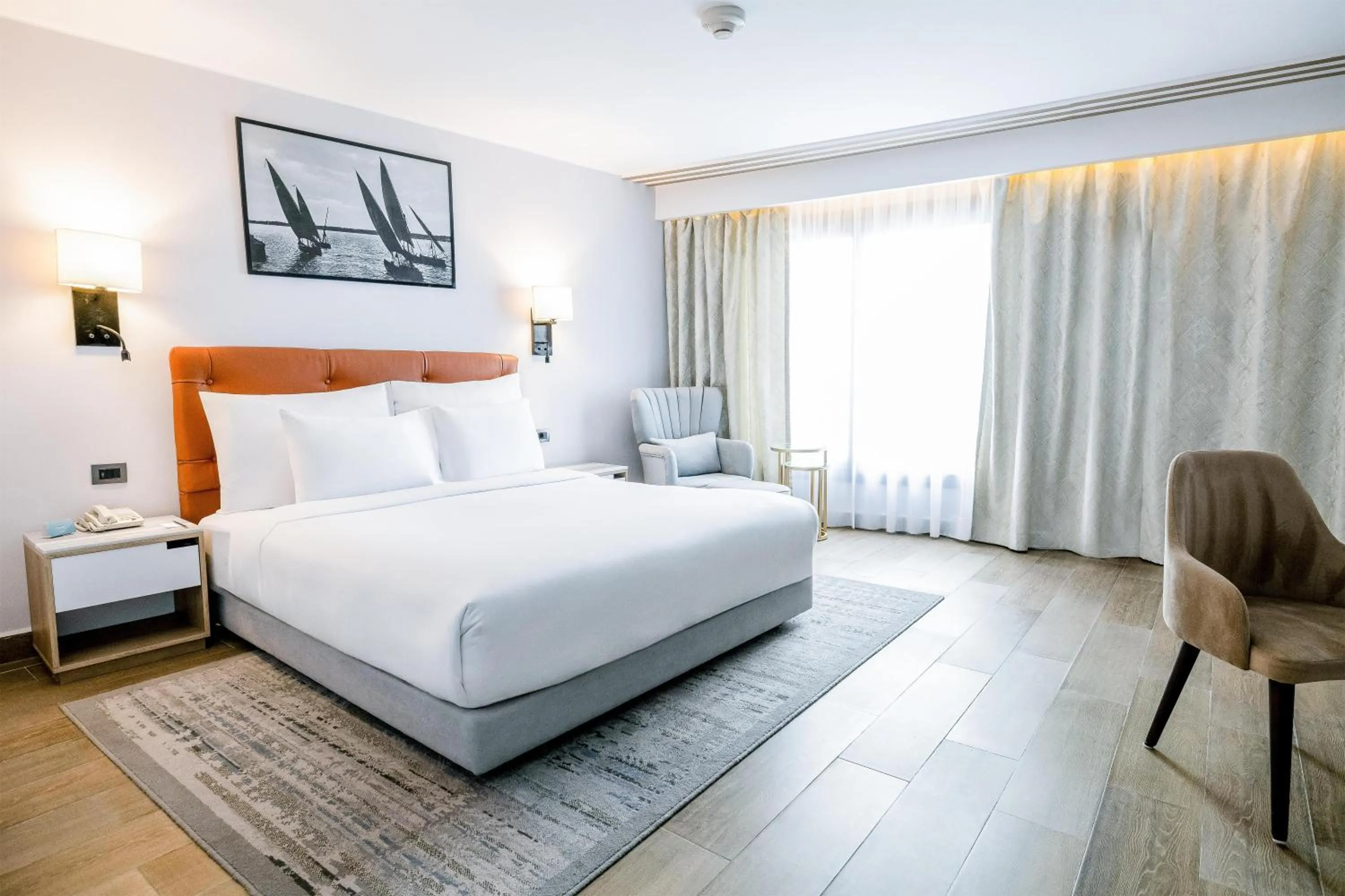 Photo of the whole room, Bed in Radisson Residences Cairo Heliopolis