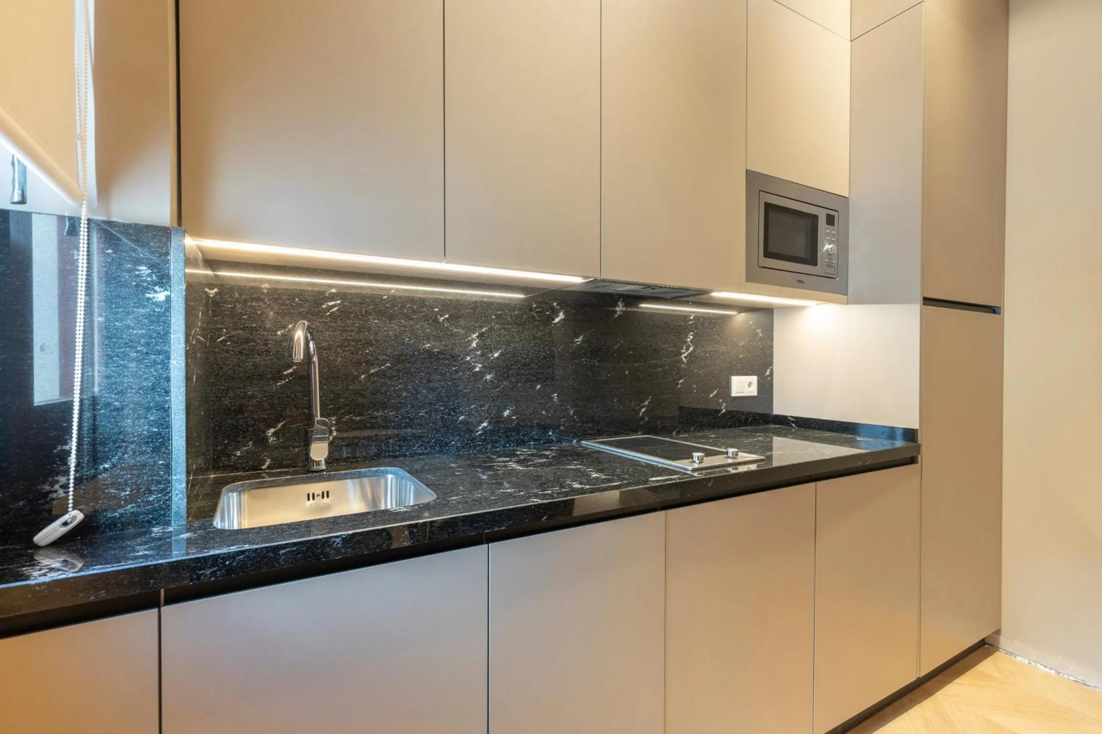 Kitchen or kitchenette in BiBo Suites Palacio de Portago