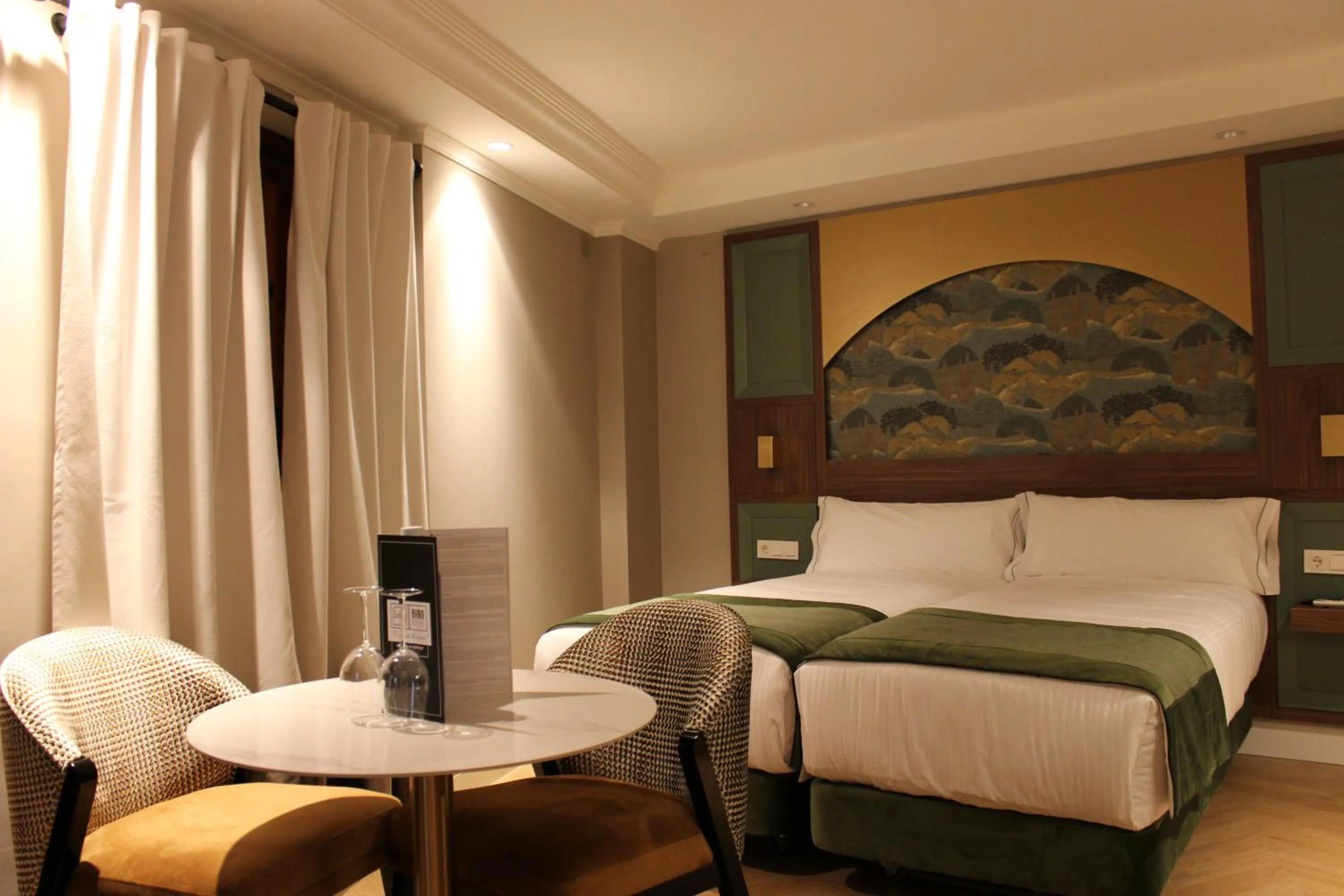 Bed in BiBo Suites Palacio de Portago