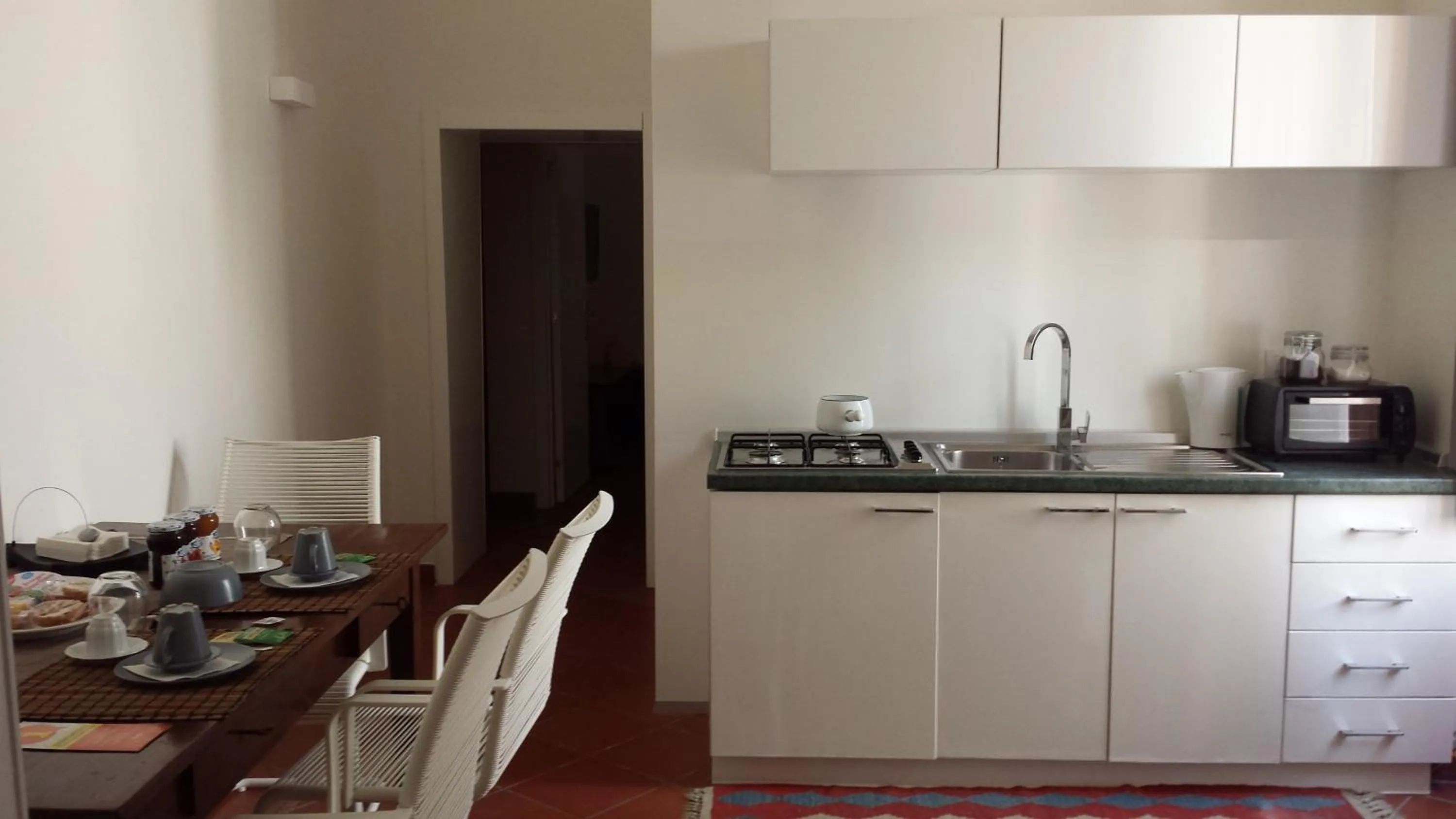 Communal kitchen in B&B Corte Dei Taralli