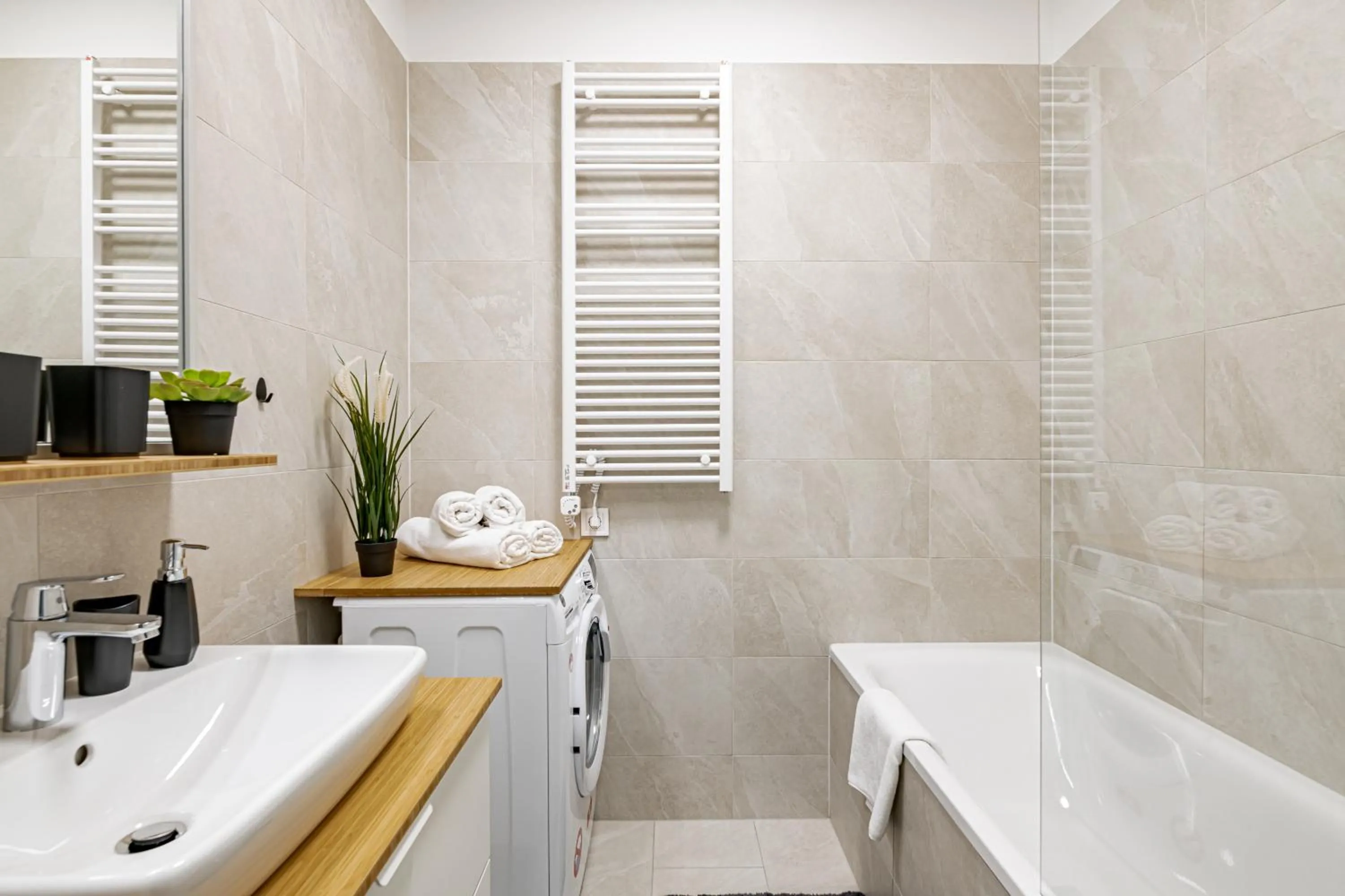 Shower in Spirit Apartments by FirstHost