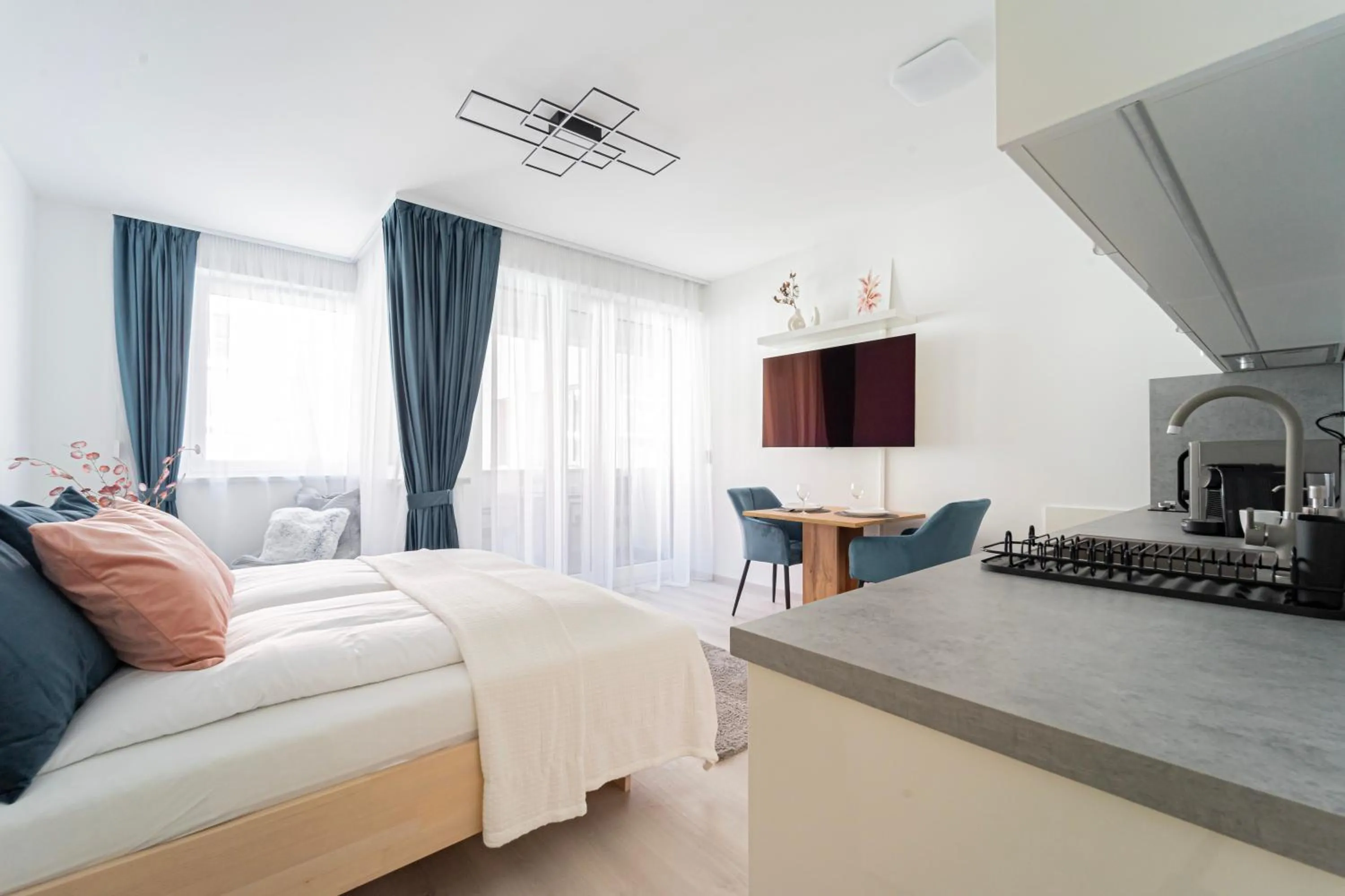 Communal lounge/ TV room, Bed in Spirit Apartments by FirstHost