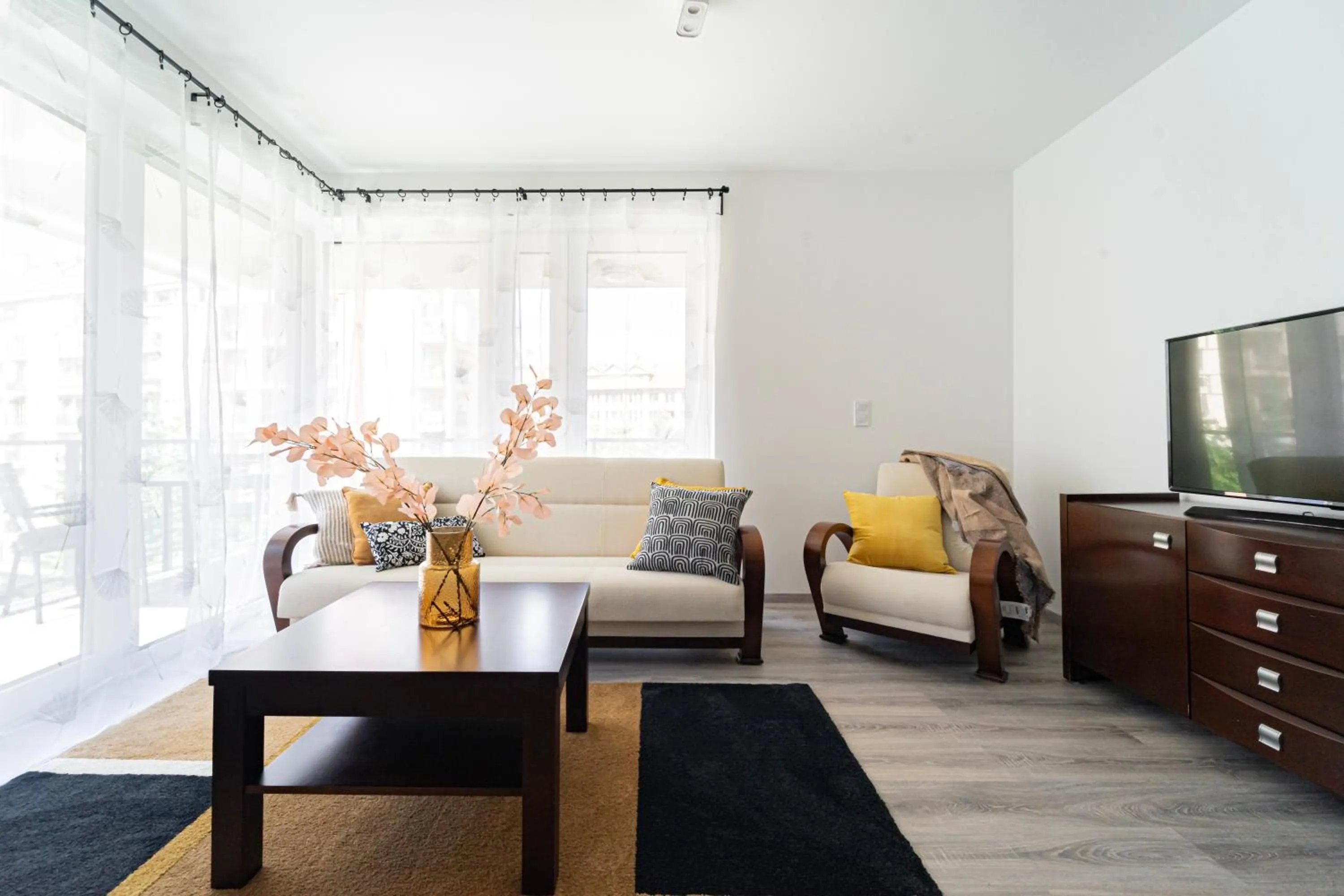 Communal lounge/ TV room in Spirit Apartments by FirstHost