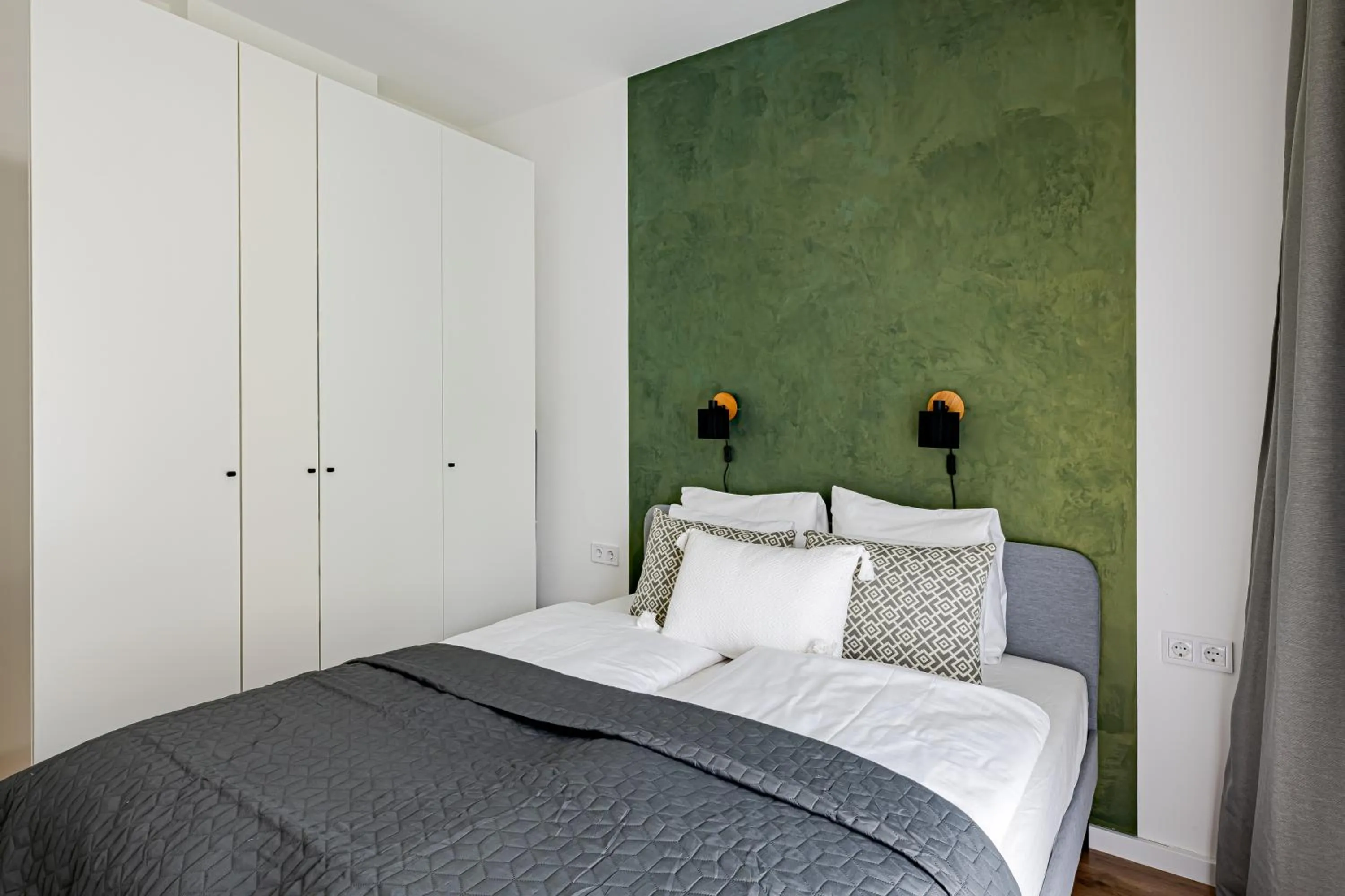 Bed in Spirit Apartments by FirstHost