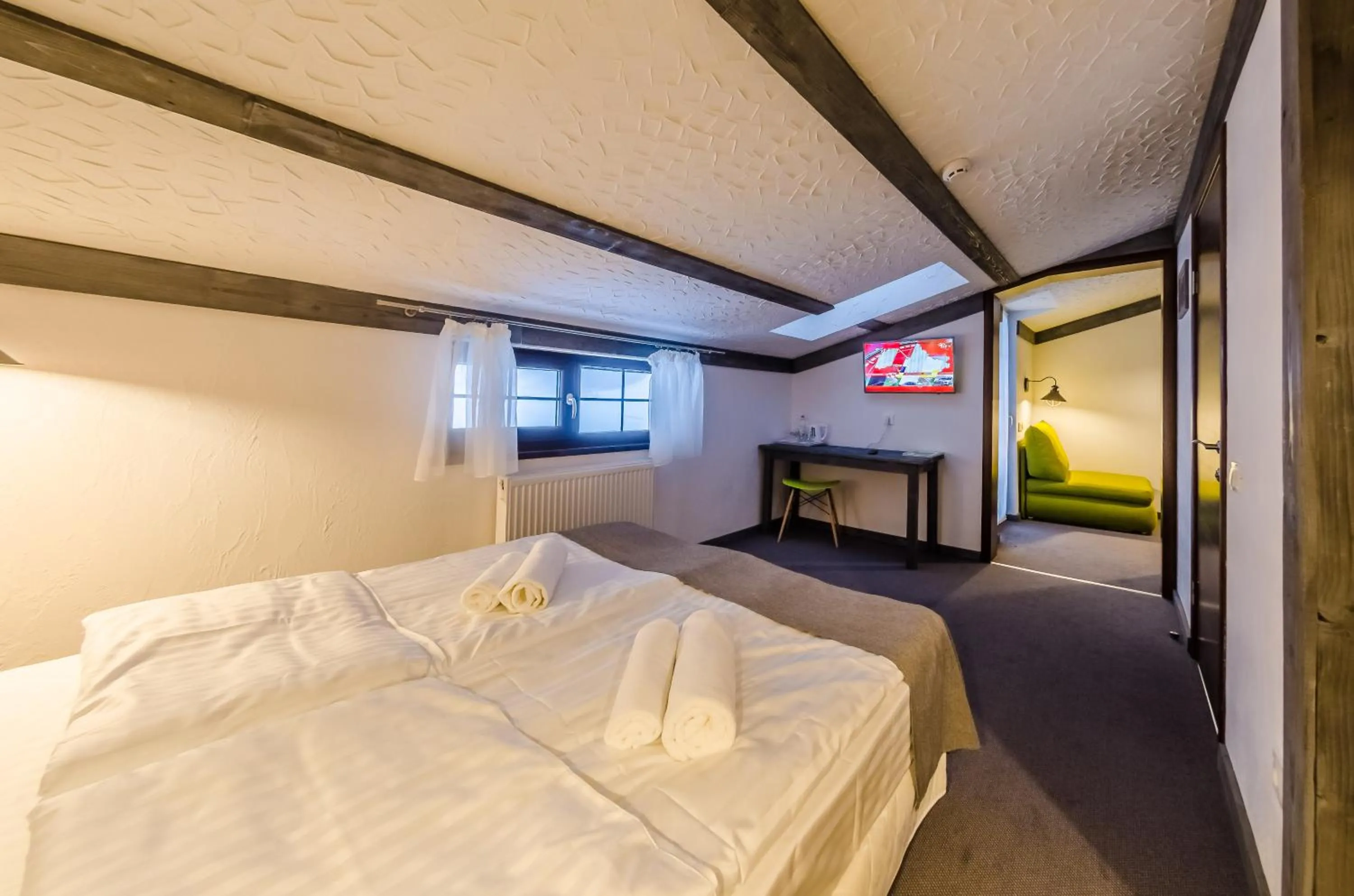 Photo of the whole room, Bed in Chalet CrepDeChine Hotel