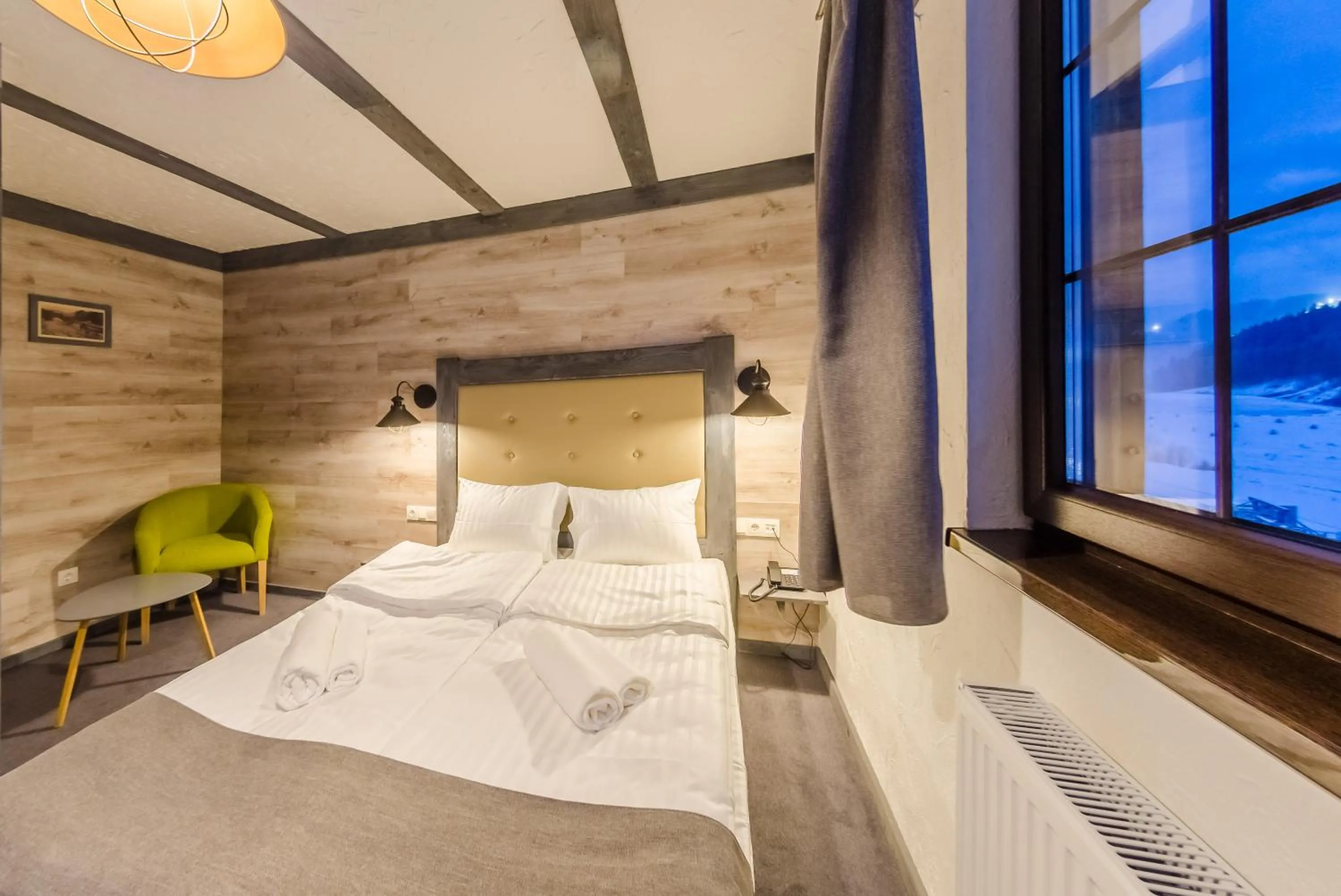 Photo of the whole room, Bed in Chalet CrepDeChine Hotel