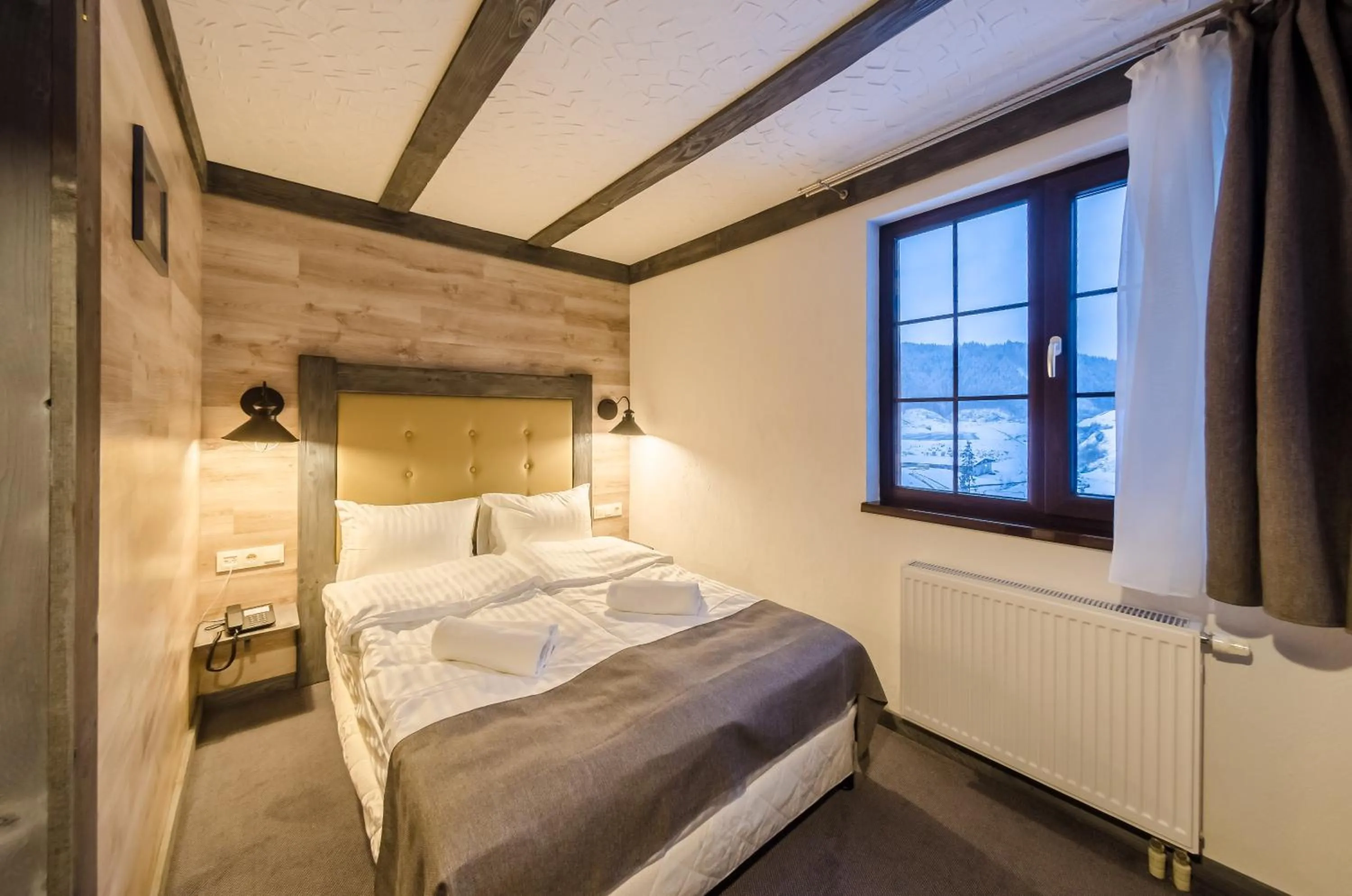 Photo of the whole room, Bed in Chalet CrepDeChine Hotel
