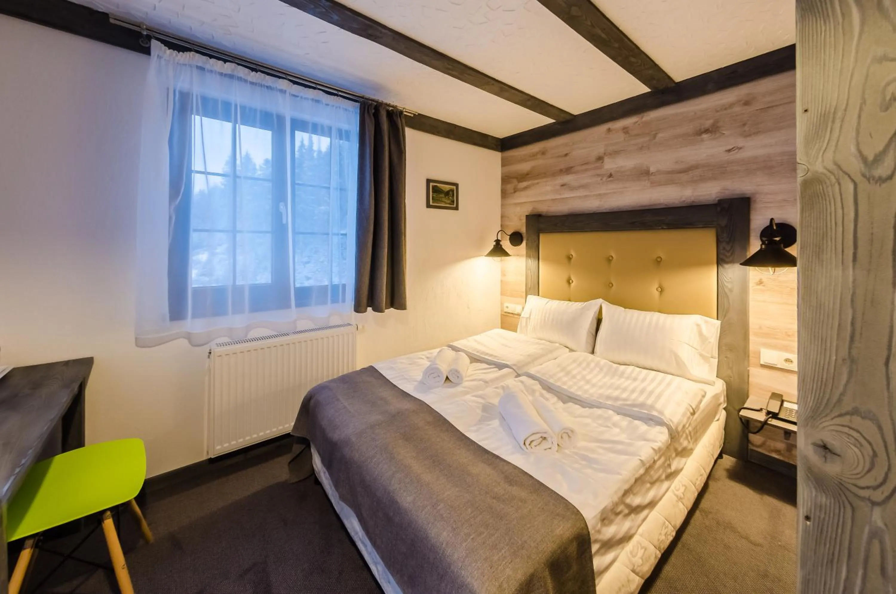Photo of the whole room, Bed in Chalet CrepDeChine Hotel