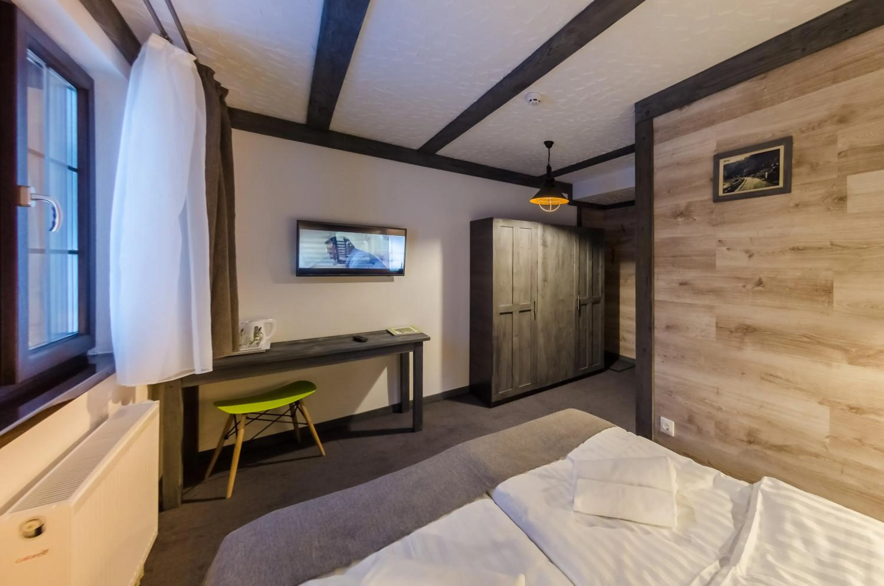 Photo of the whole room, Bed in Chalet CrepDeChine Hotel