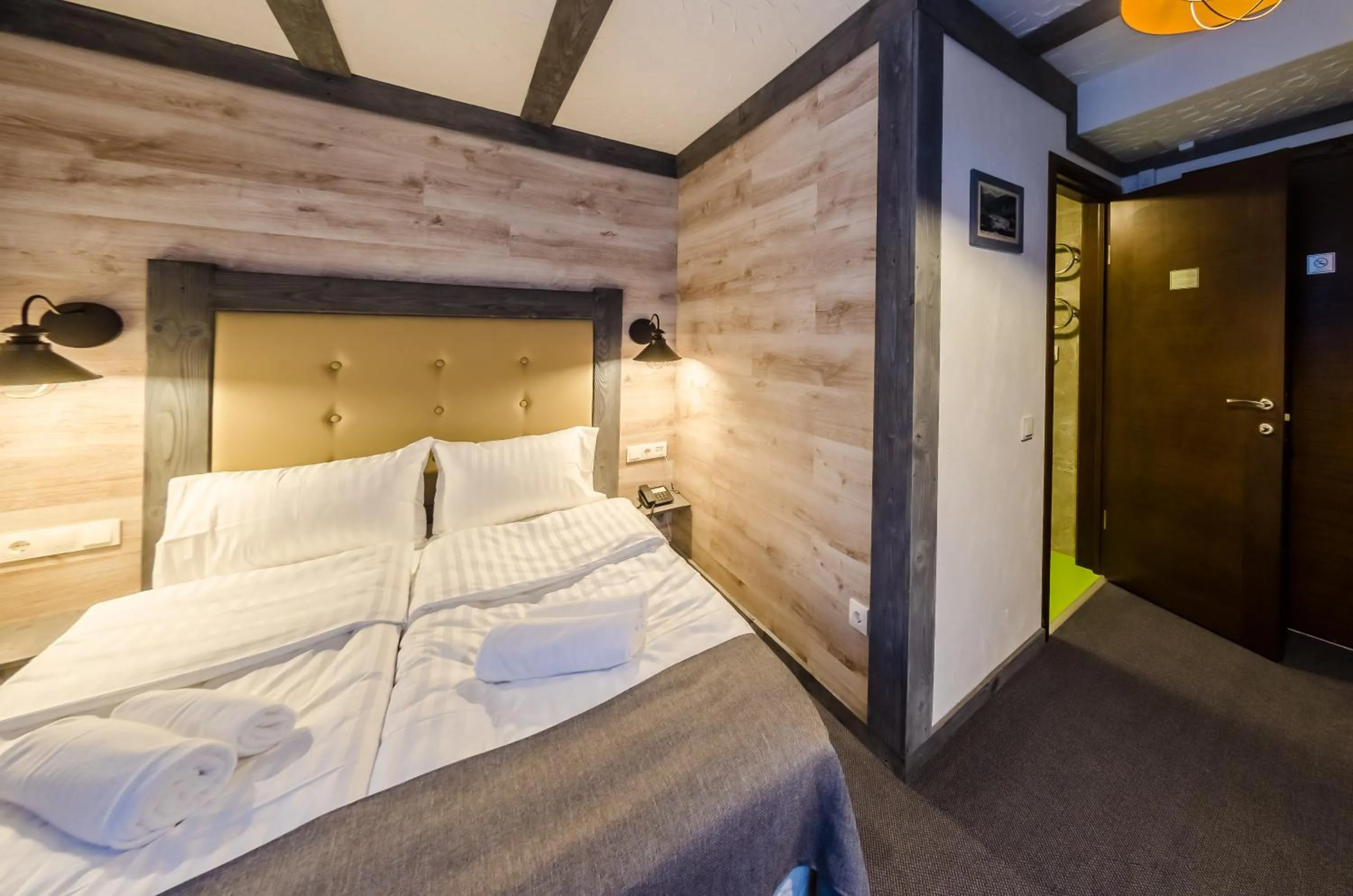 Photo of the whole room, Bed in Chalet CrepDeChine Hotel