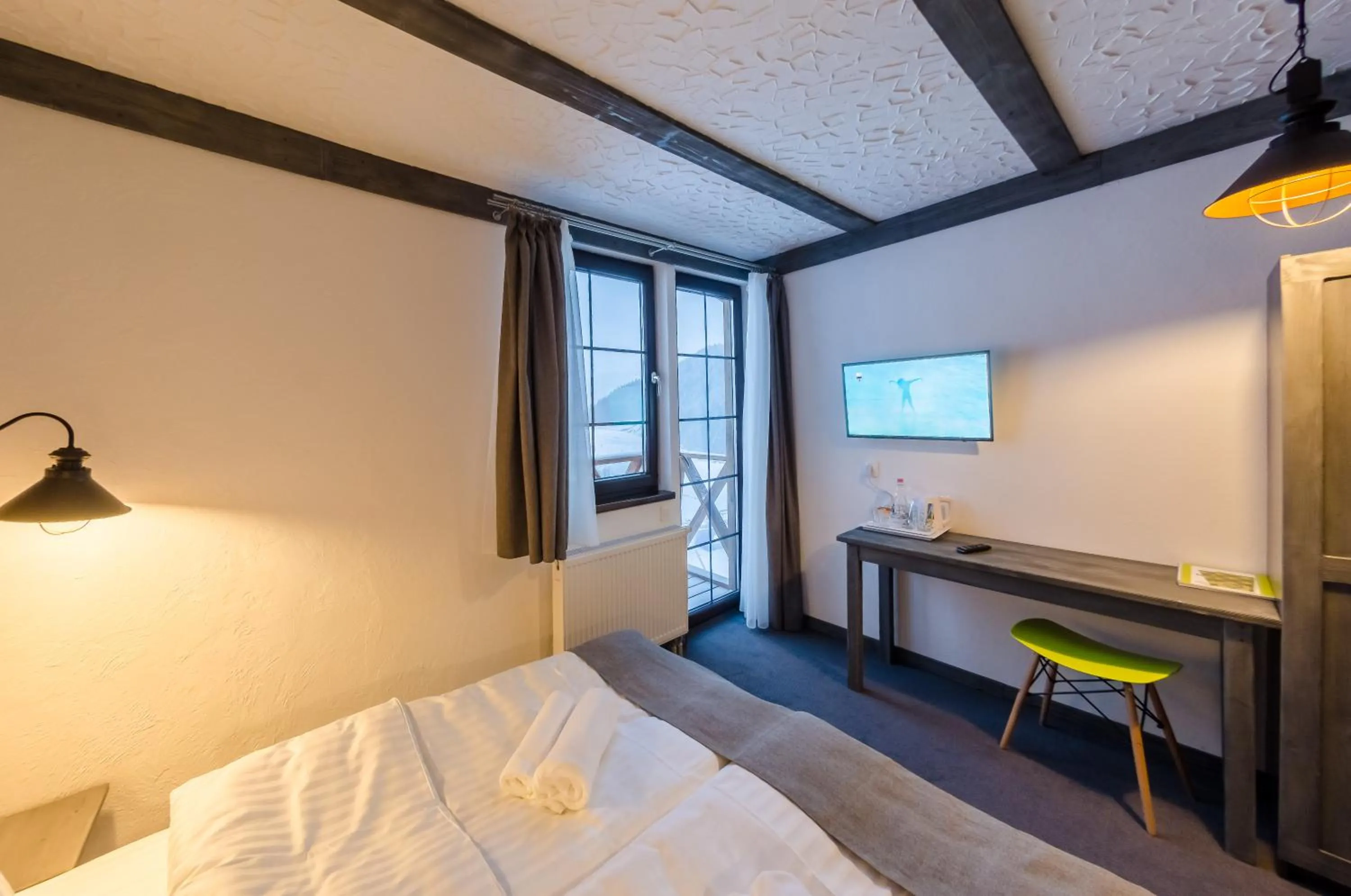 Photo of the whole room, Bed in Chalet CrepDeChine Hotel