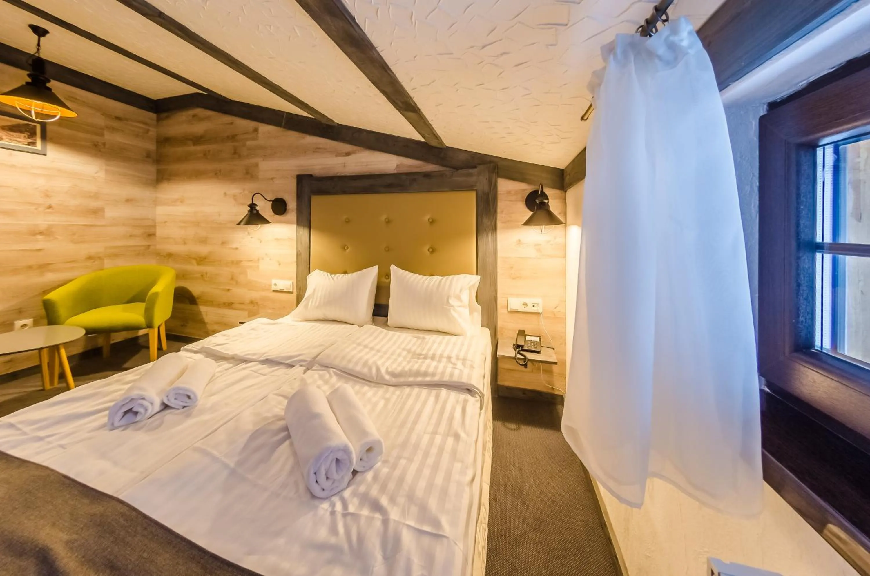 Photo of the whole room, Bed in Chalet CrepDeChine Hotel