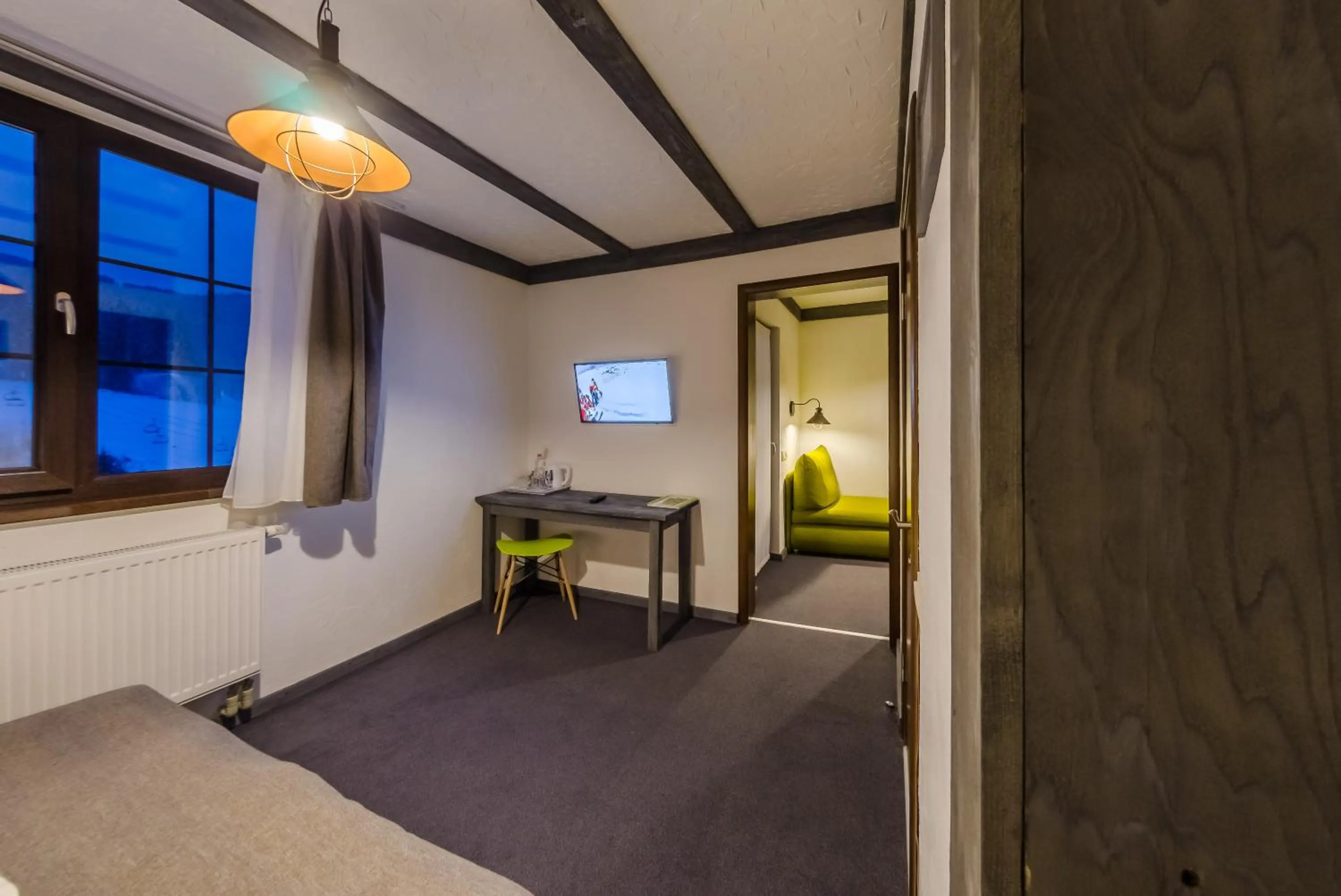 Photo of the whole room, Bed in Chalet CrepDeChine Hotel