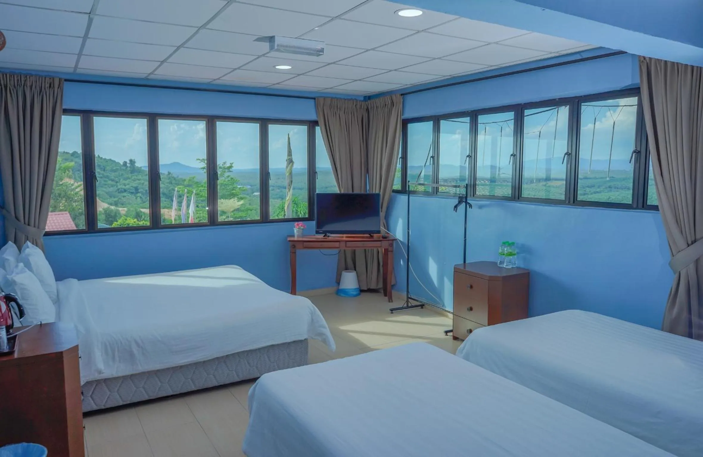 Bed in LABIS SUNRISE FARM STAY