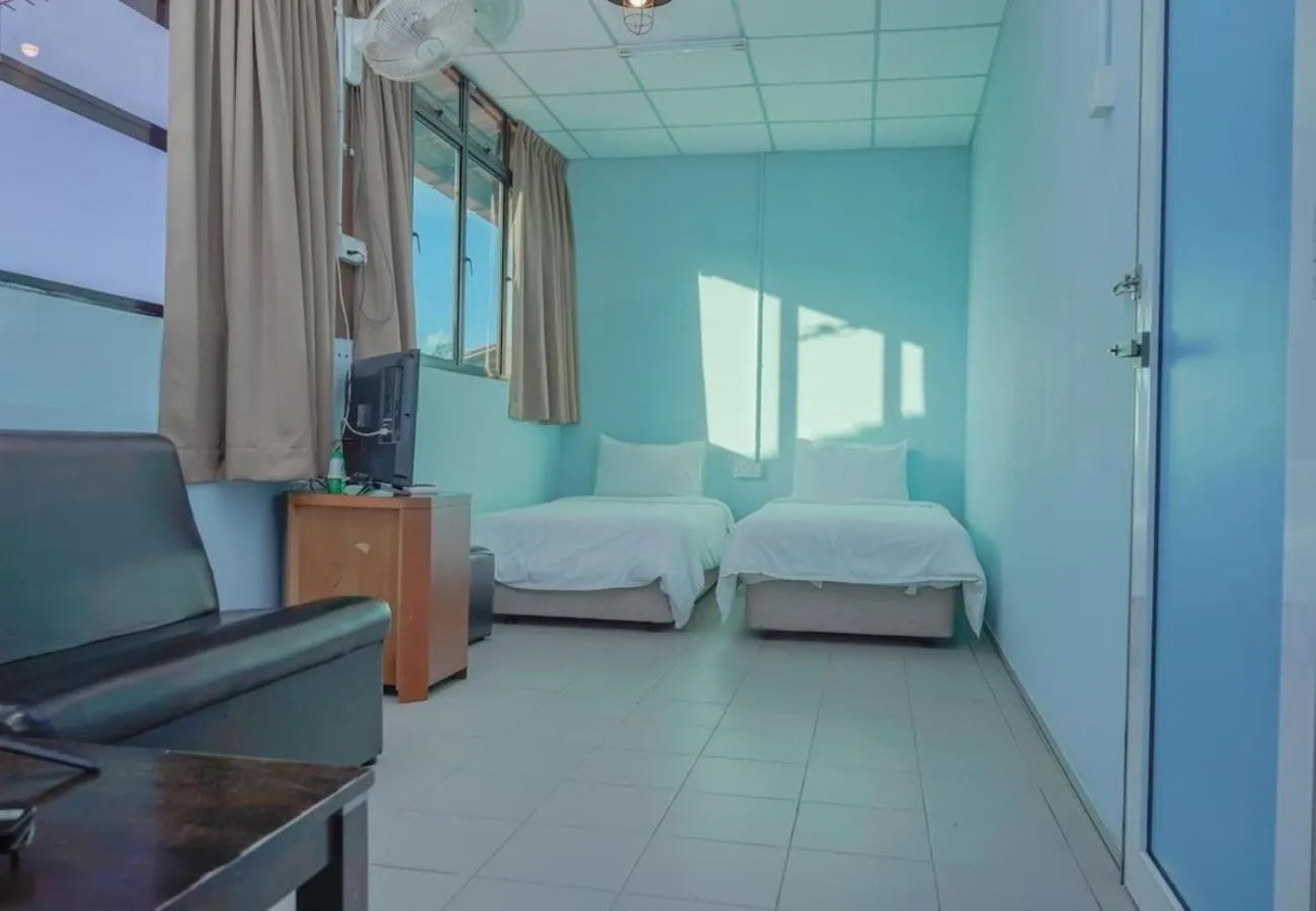 Bed in LABIS SUNRISE FARM STAY