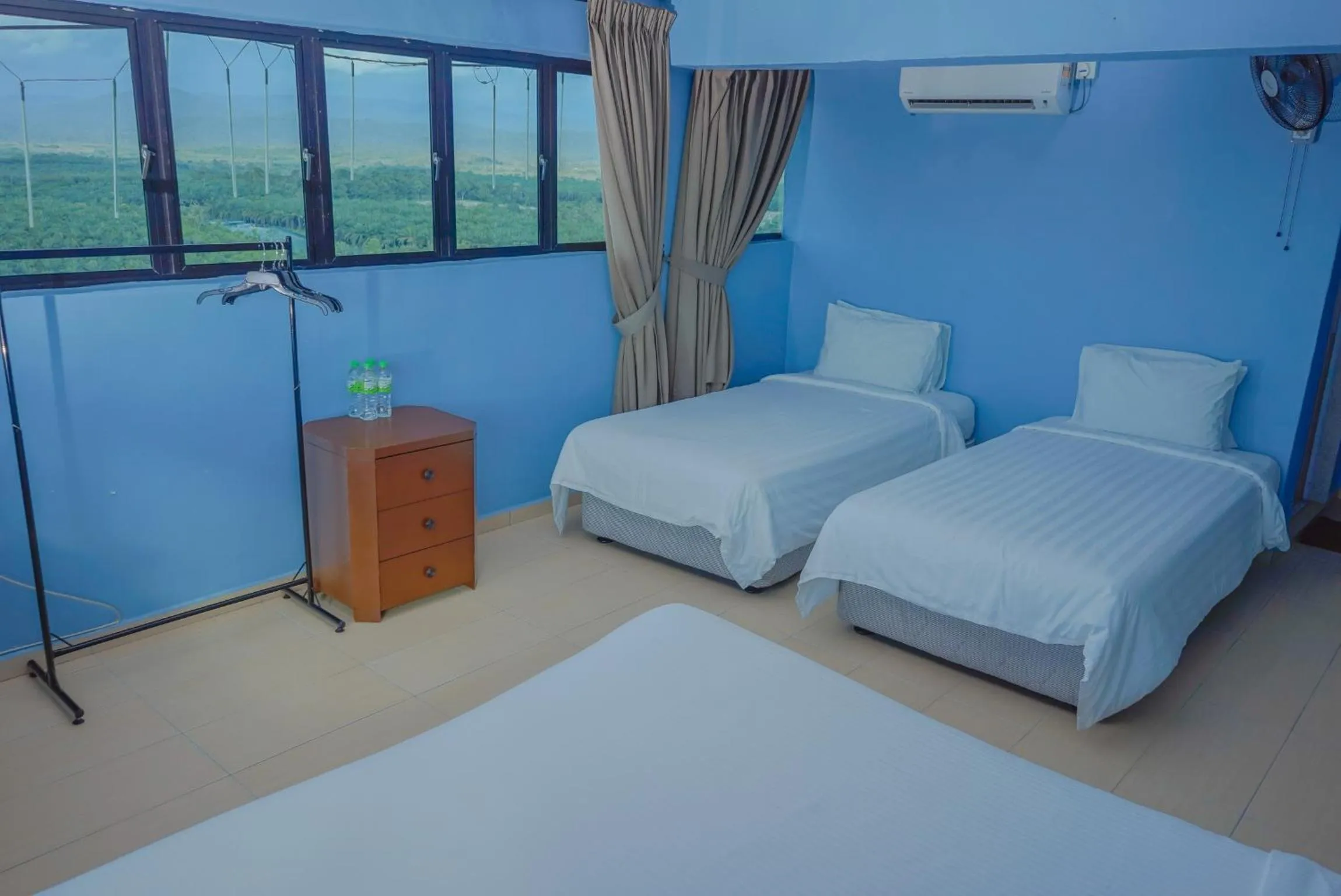 Bed in LABIS SUNRISE FARM STAY