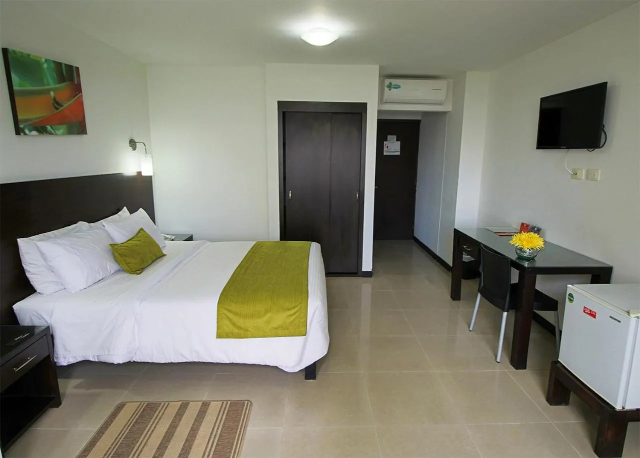 Bed in Hotel Pinares Plaza