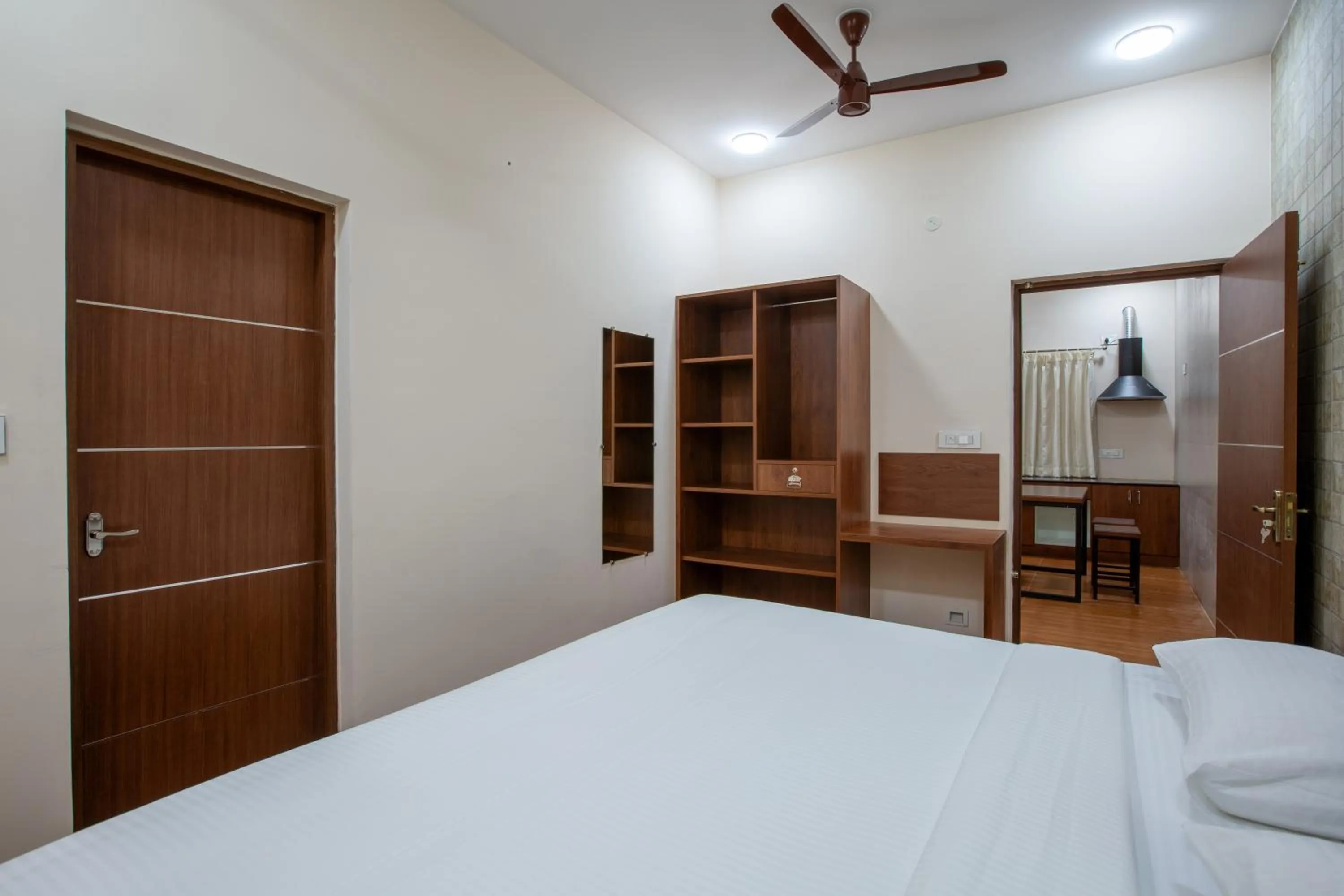 Photo of the whole room, Bed in MUGUNDAN 'S SMART STAY
