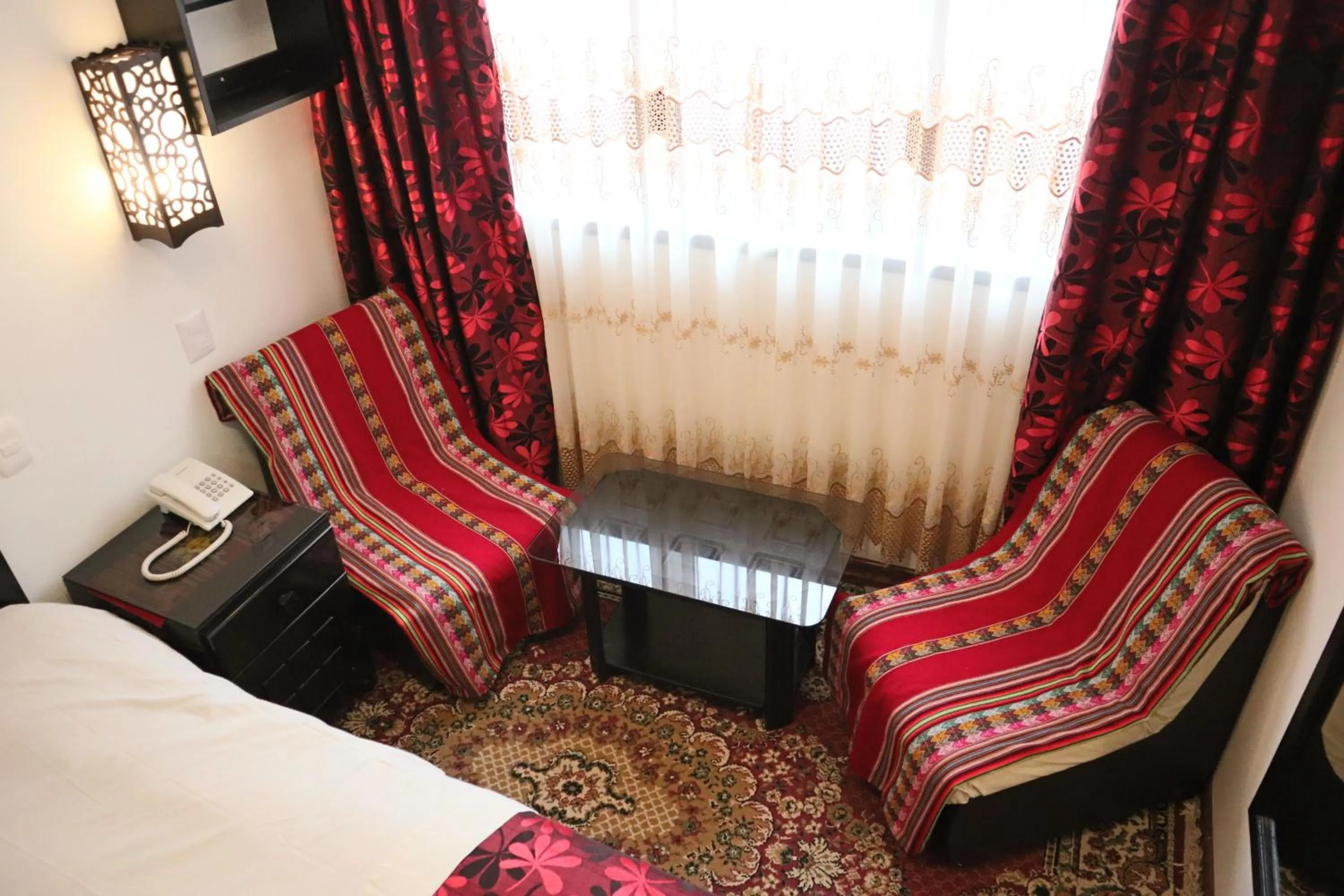 Seating area, Bed in Cusco Bed and Breakfast