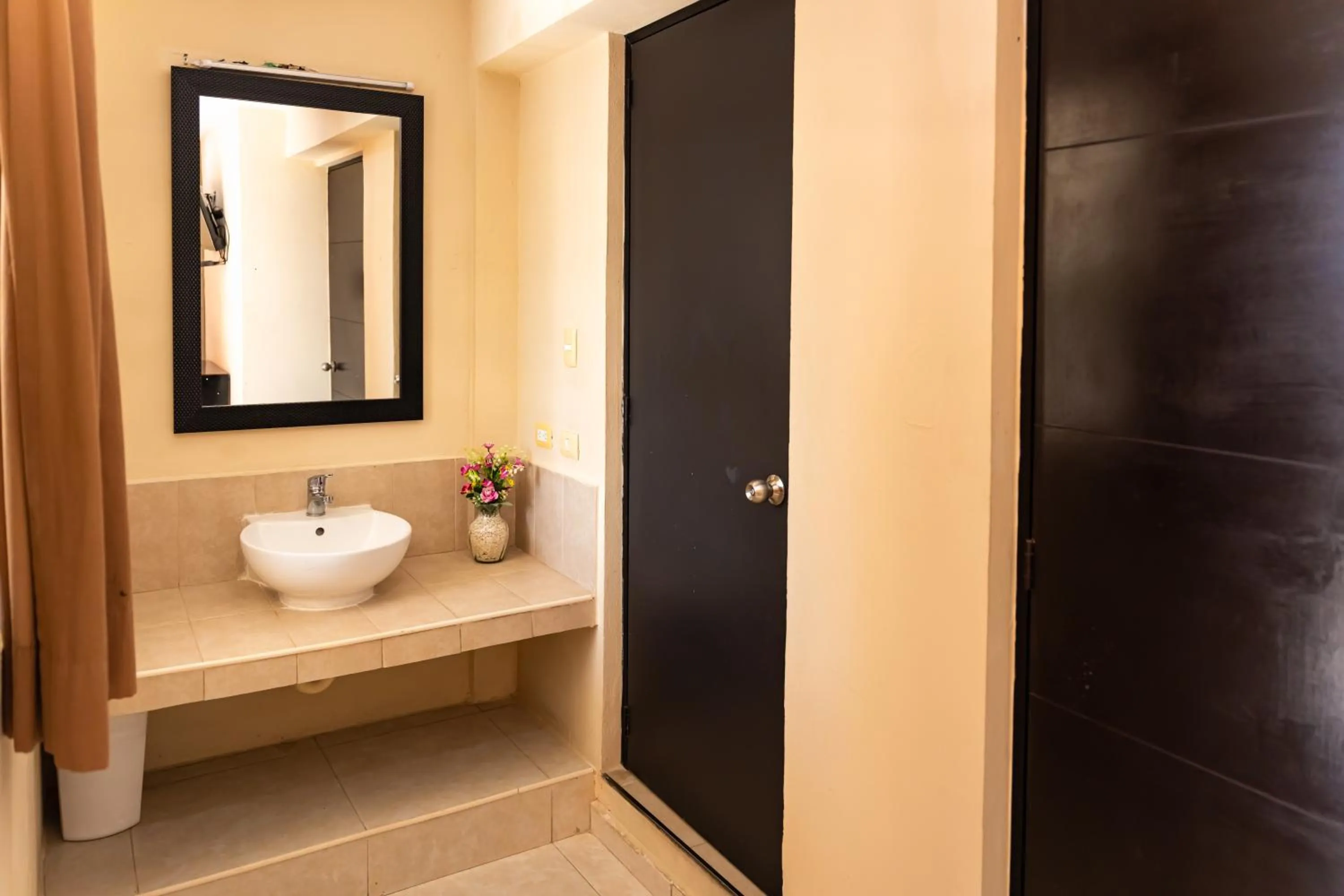 Bathroom in Hotel & Suites Domani