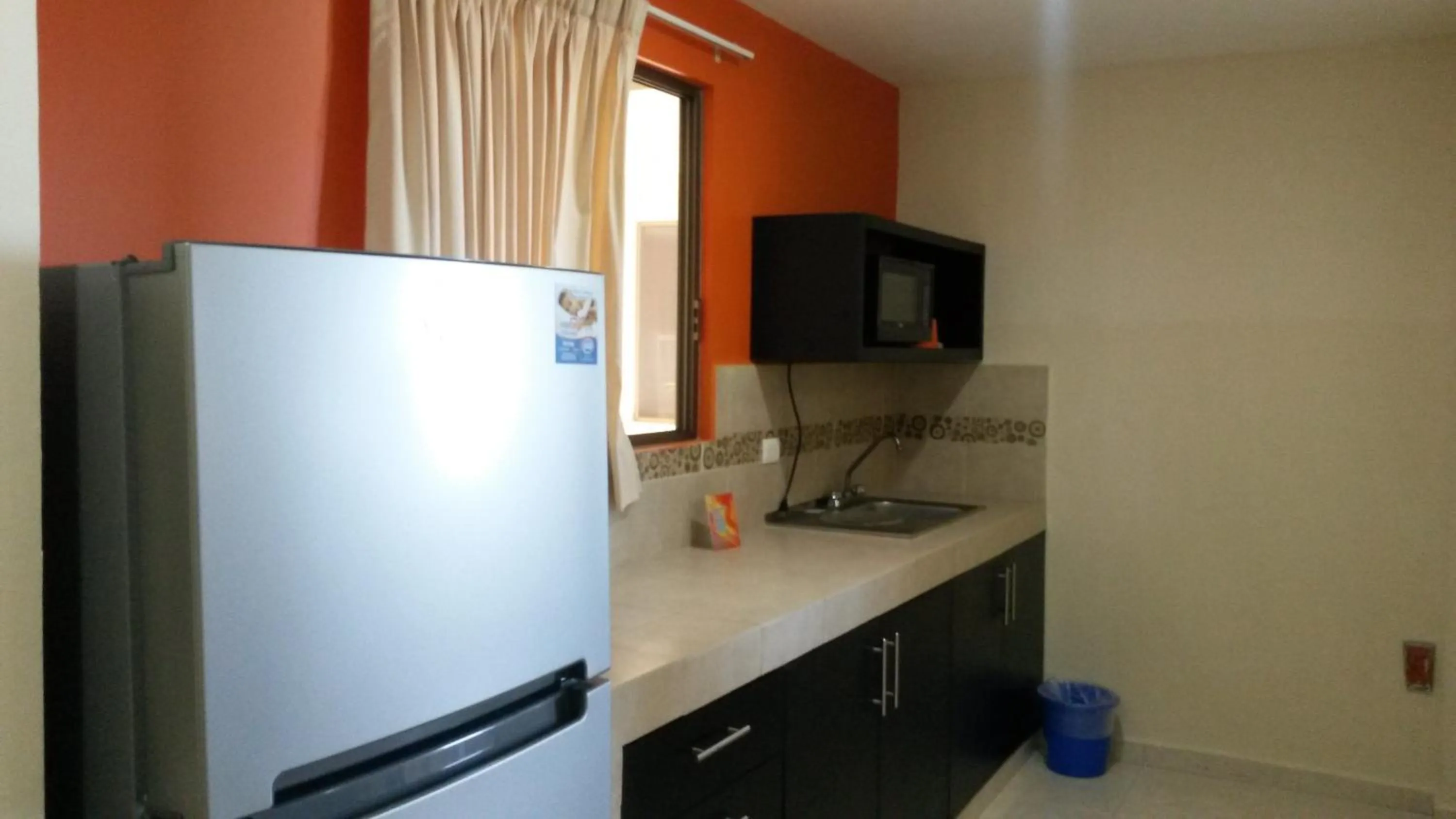 Kitchen or kitchenette in Hotel & Suites Domani