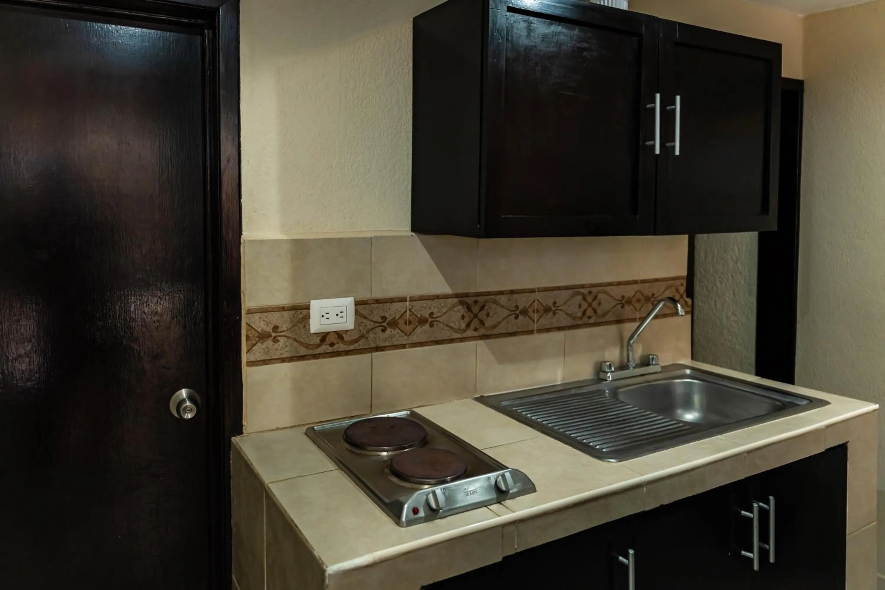 Kitchen or kitchenette in Hotel & Suites Domani
