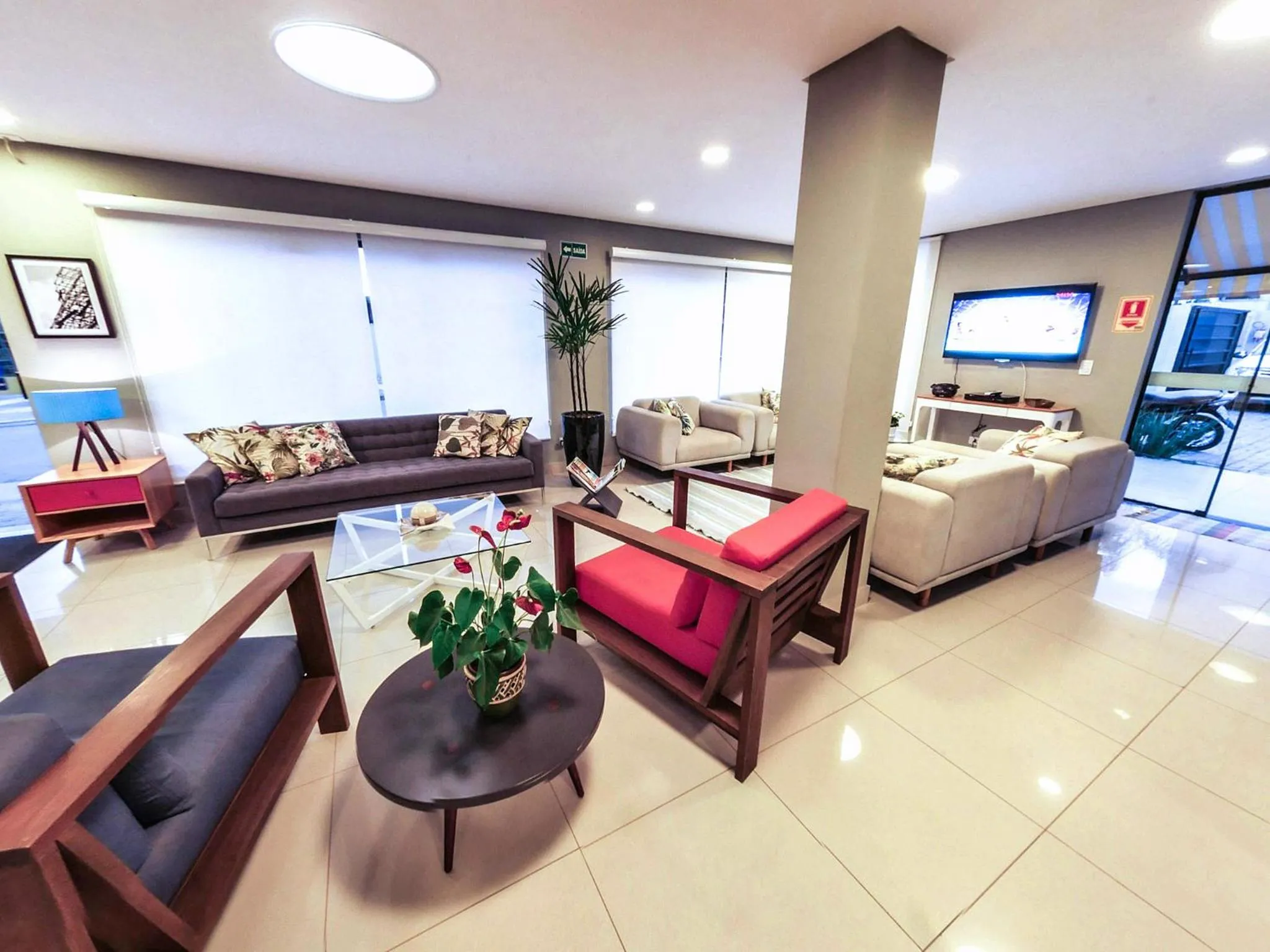 Communal lounge/ TV room in CLH Suites Bonito Centro