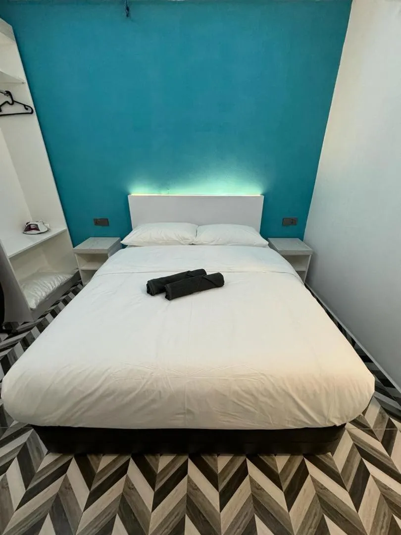 Bed in HOTEL HOMESTAY MACHANG D Sega