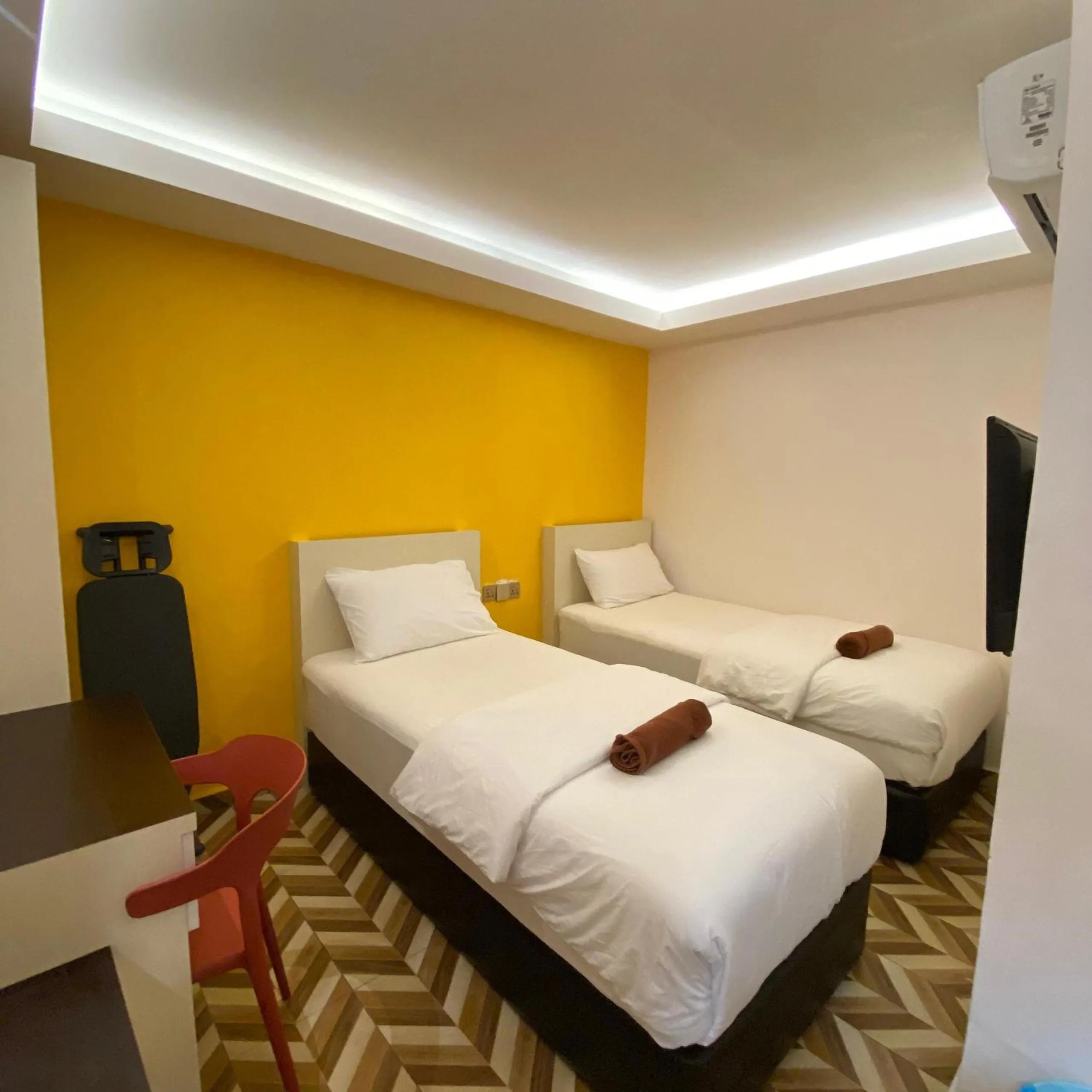 Bed in HOTEL HOMESTAY MACHANG D Sega