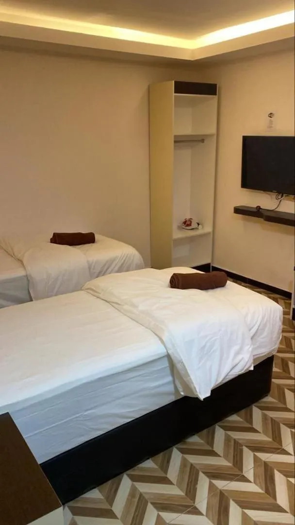 TV and multimedia, Bed in HOTEL HOMESTAY MACHANG D Sega