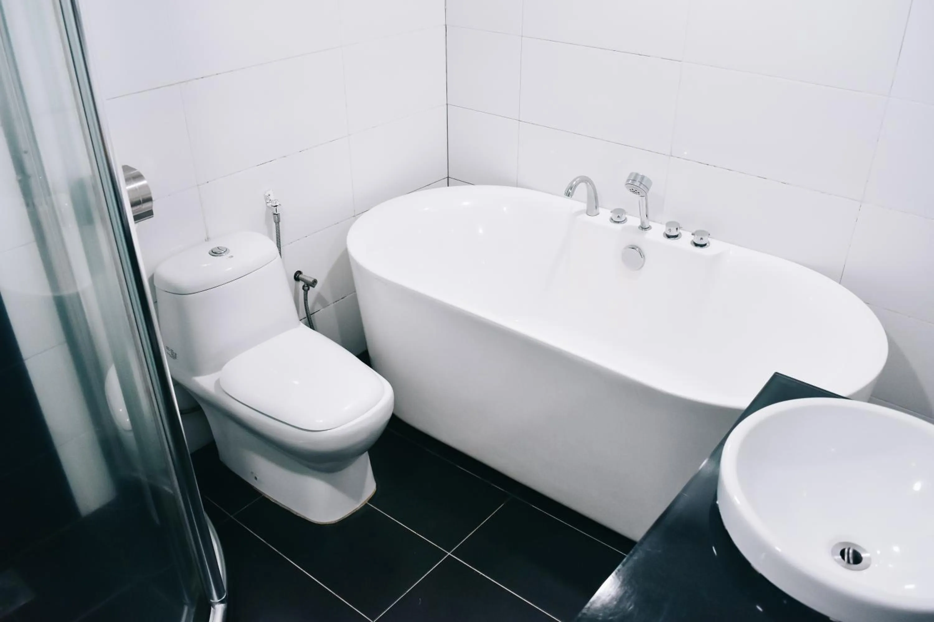 Bathroom in J Suites Hotel