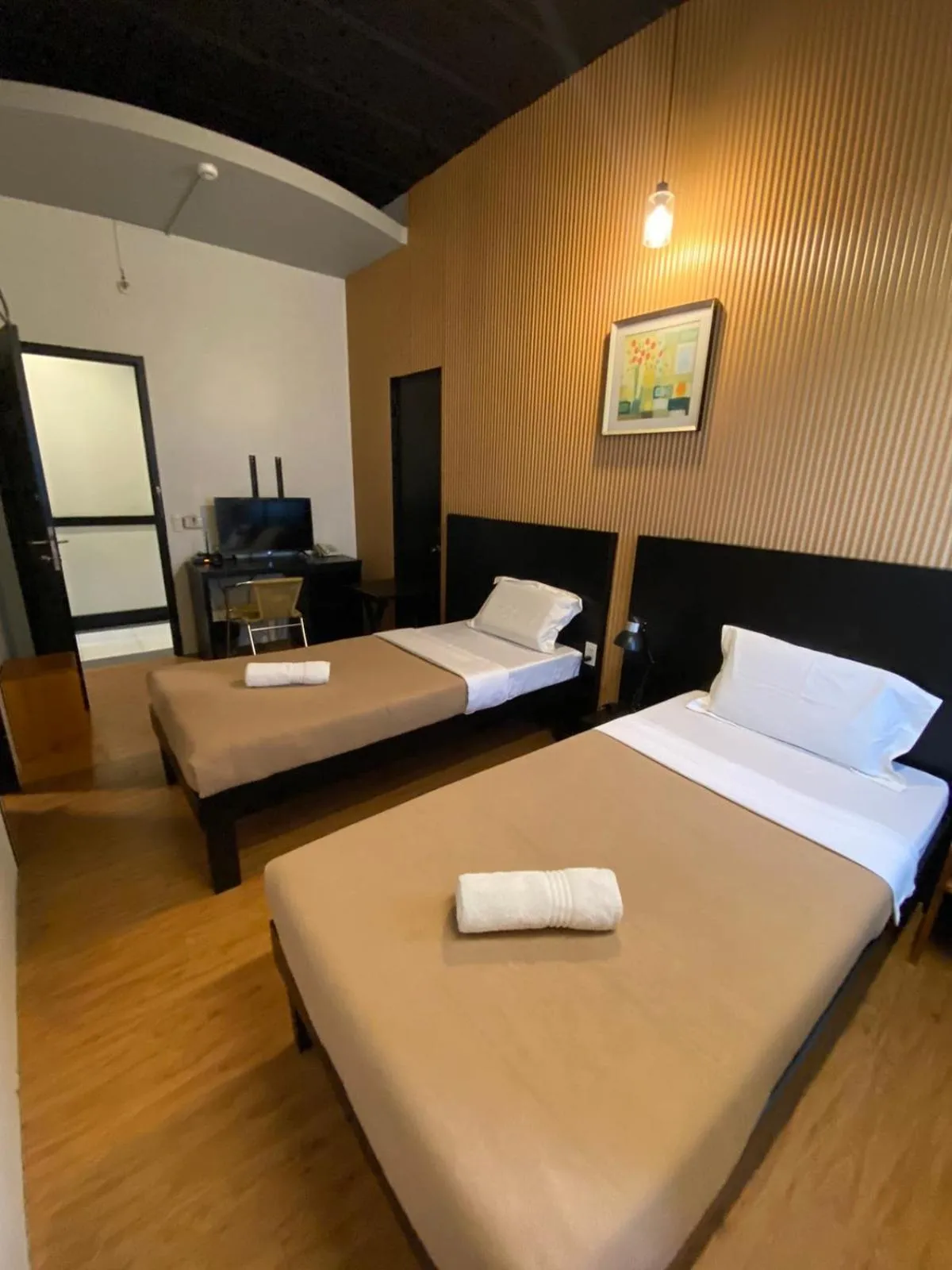 Bed in First Pacific Inn Davao