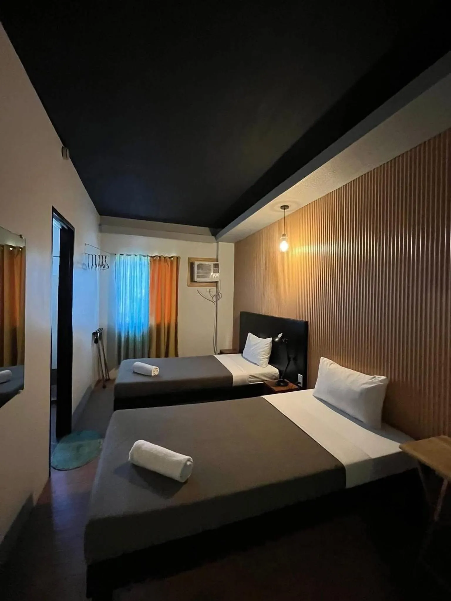 Bed in First Pacific Inn Davao