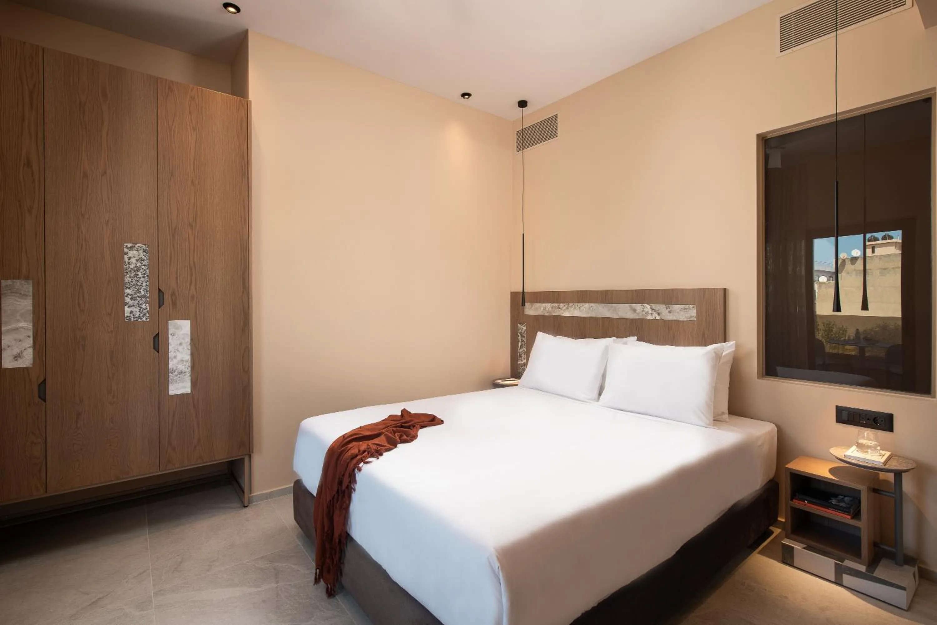 Bed in Cosmeen Lifestyle Boutique Stay