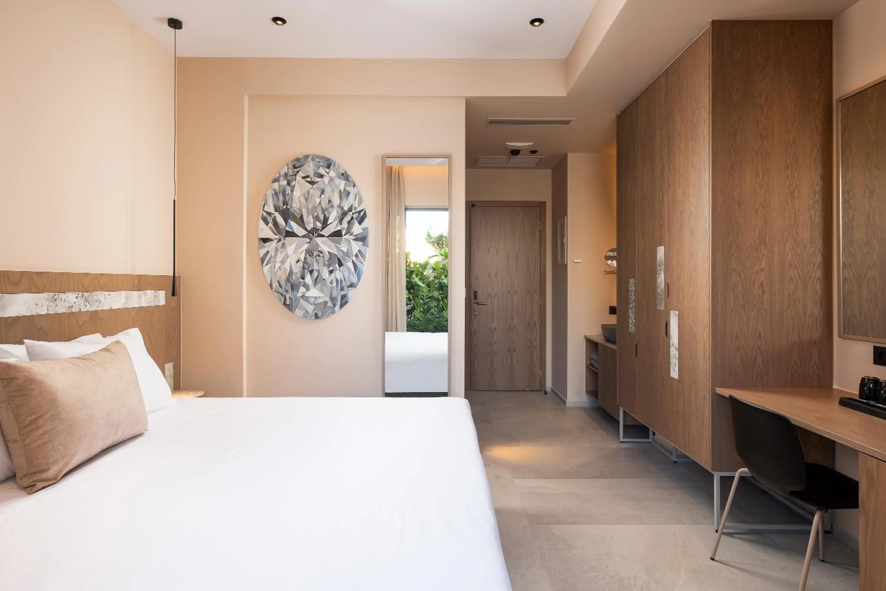 Bed in Cosmeen Lifestyle Boutique Stay