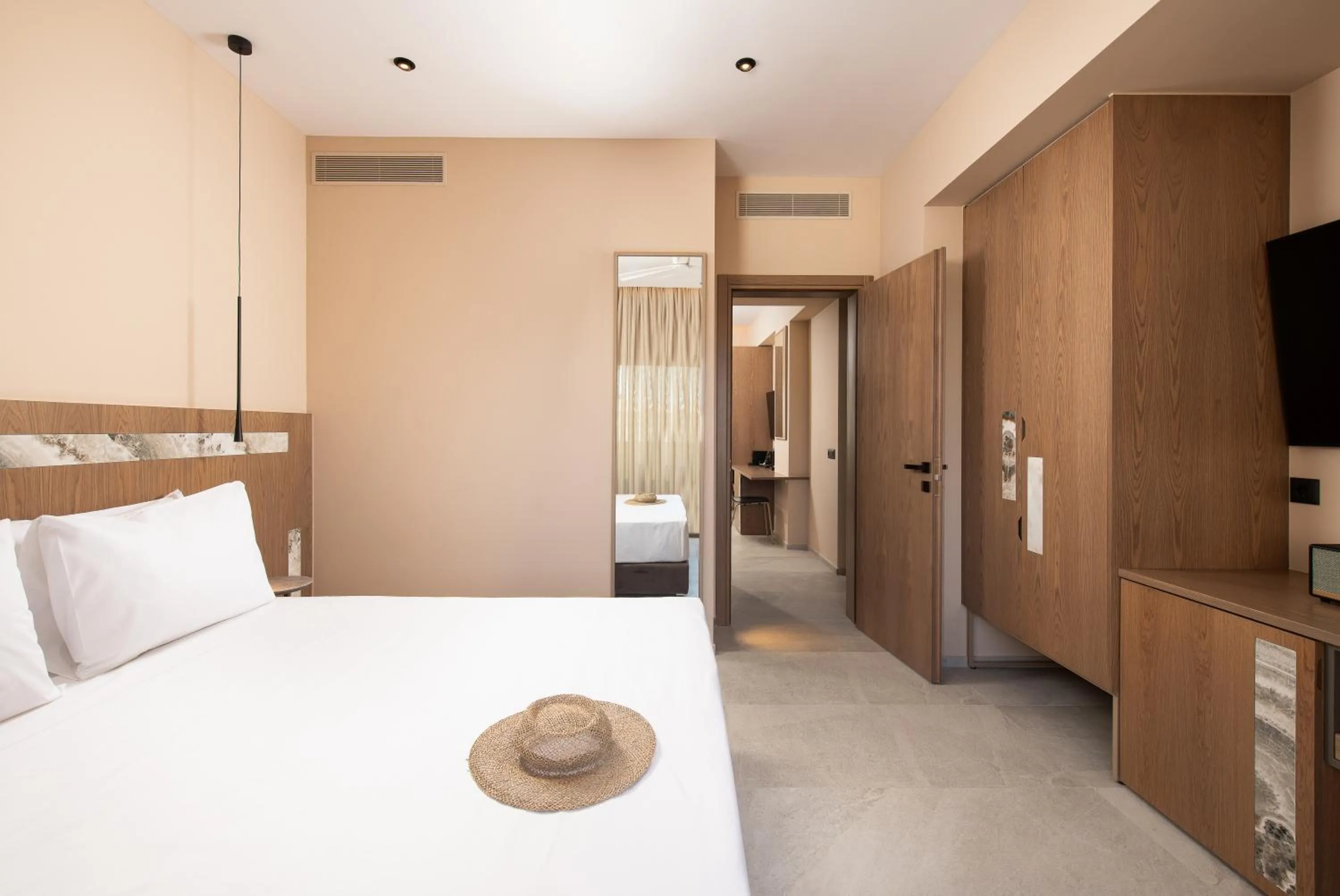 Bed in Cosmeen Lifestyle Boutique Stay